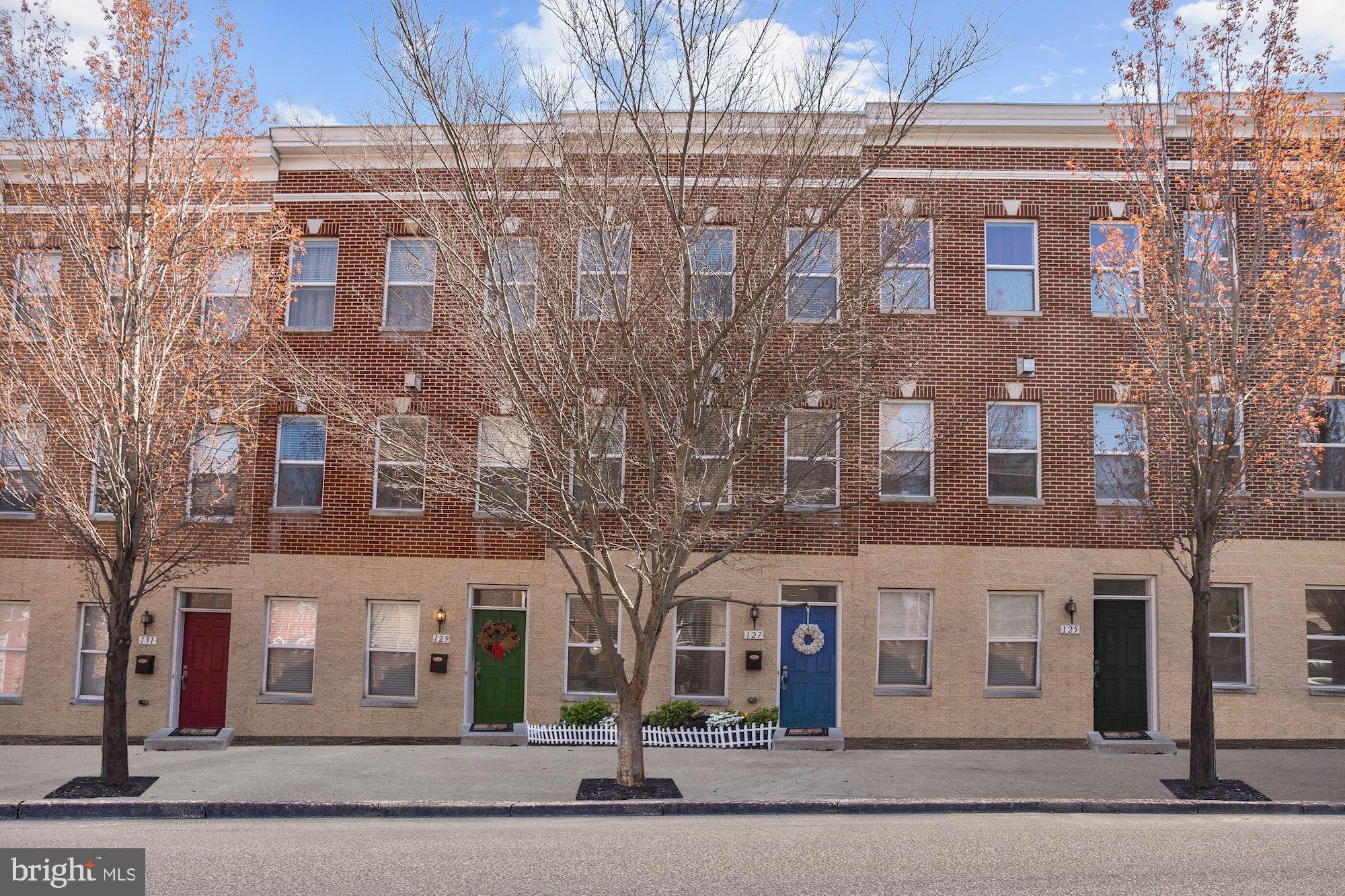 Immaculately maintained rowhome with a newly installed roof boasting lofty windows, light filled interiors, and design-inspired features throughout! Gleaming hardwood floors; Crown molding and recessed lighting; Sleek stainless steel appliances; Granite countertops and tile backsplash; Peninsula with breakfast bar; Ample cabinetry; Generously sized bedrooms with full en-suite baths; Primary bath with decadent glass enclosed shower and dual vanities; Bedroom level laundry; 1-car, attached garage; Exterior Features: Deck | Balcony, Rooftop Deck, Exterior Lighting, Sidewalks, Street Lights, and Landscaped Grounds. Community Amenities: Explore all that Baltimore has to offer with the National Aquarium, Camden Yards, and M&T Stadium. A vast variety of entertainment, shopping, and dining options await you at Baltimore's Inner Harbor, The Gallery, Woodberry Kitchen, and Baltimore's Center Stage. With close proximity to Thames Street Park, Patterson Park, and Anchorage Promenade Park, your outdoor recreation activities are endless! Major commuter routes include I-95, I-83, and I-695.