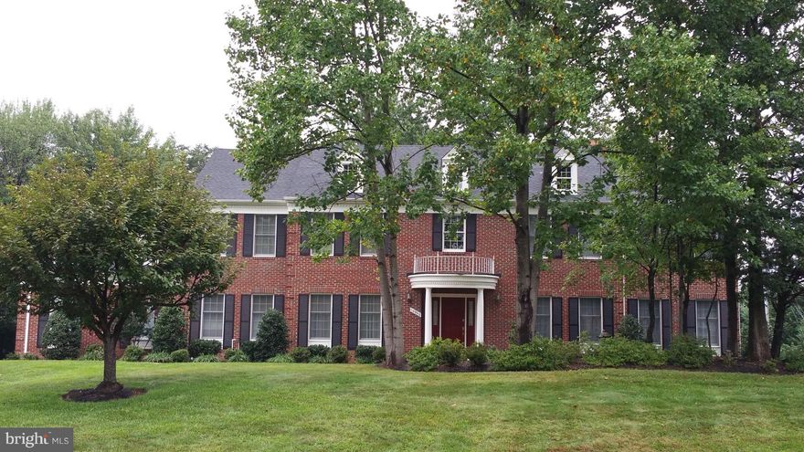 Rare opportunity to own in this sought after neighborhood. Absolutely stunning brick front home w/ 2 story grand foyer, gorgeous Brazilian Cherry HW floors, new paint, custom trim work, enormous family room, gourmet kitchen, library, sunroom, main level bedroom, 2 master suites on upper level, updated master bath, and many more updates and upgrades. 3 car side loading garage, almost 1 acre yard.