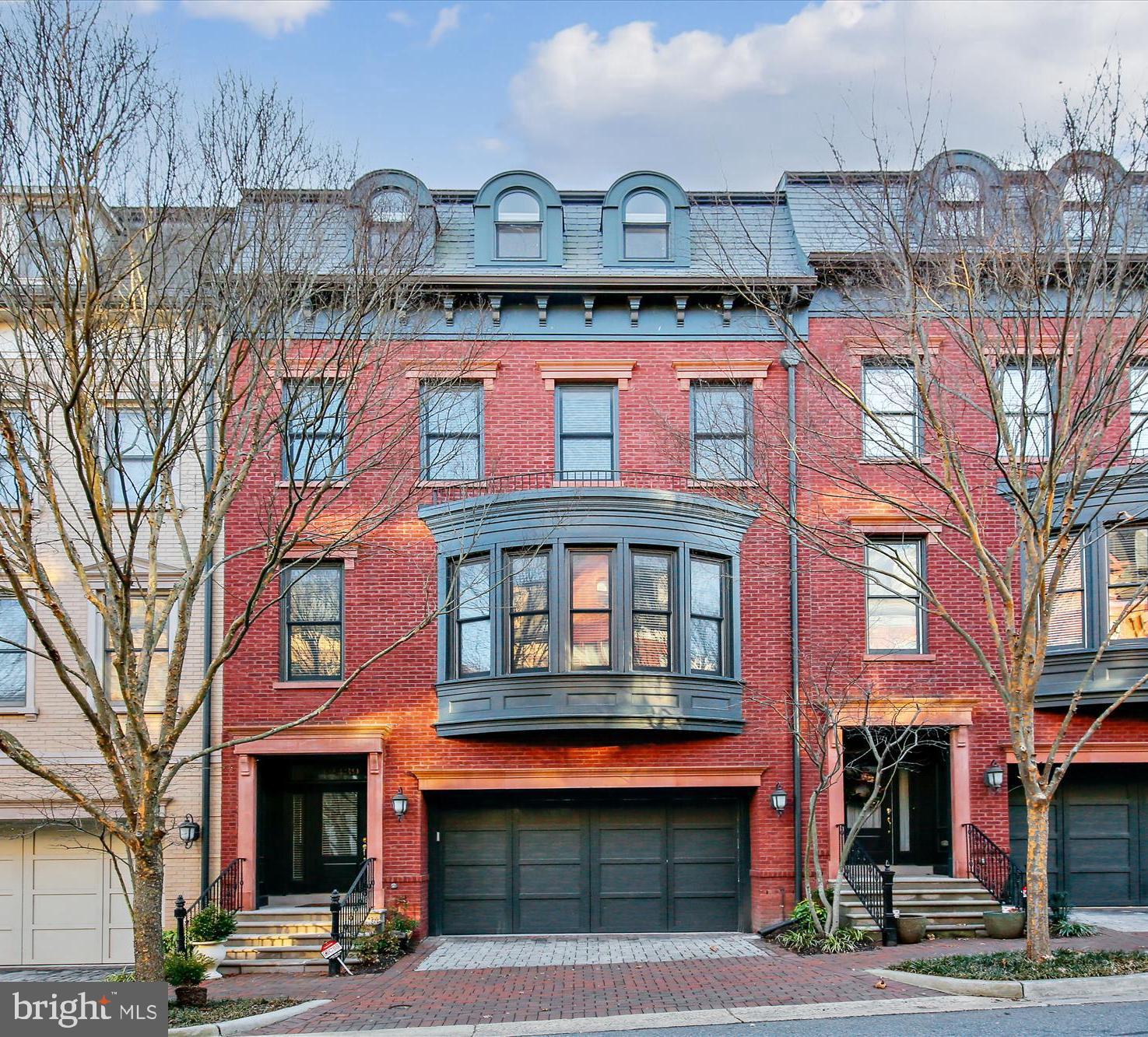 Welcome home to this stunning four-level, nearly 4,000SF Brownstone, located in the heart of Park Potomac, aptly named “The Best of Bethesda” by Bethesda Magazine. All of your basic needs, and then some, just around the corner include fine dining, gourmet grocery, boutique shops and more.
In this rare luxury townhome, you will find pristine hardwood floors, exuberant natural light throughout its high ceilings and an open concept floor plan that allows you to flow from the chef-inspired kitchen to the family room with ease. This exquisite home is equipped with a Viking 6-burner range, 4 bedrooms, 3 full bathrooms, 2 half bathrooms, 2 gas fireplaces, 2 attached decks, 2-car garage and an elevator! Enjoy your coffee on the mid-level deck off the kitchen , or entertain on your amazing rooftop deck! From the spacious Owners suite with separate sitting room, to the family room, to the formal dining area or the personal library, it is nearly impossible not to fall in love with this home. It is nestled in a low HOA community with a fitness center, community pool, clubhouse and convenient shuttle to the Metro. The opportunity to own a home like this does not often present itself, but when it does, it won't last long.