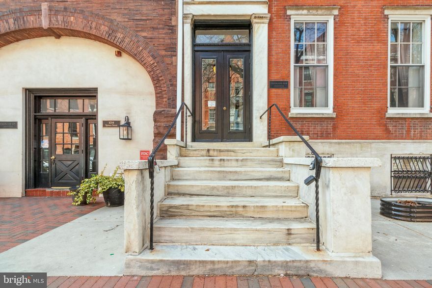Welcome to Strickland Row, where historic charm meets urban living. Tucked away in the heart of Washington Square West, one of Center City’s most coveted neighborhoods offering the perfect blend of timeless elegance and modern convenience. Step into this spectacular 1-bedroom plus den/office condominium and be instantly transported by the old-world charm and breathtaking architectural details featuring 12’+ ceilings, original hardwood floors, marble mantles, two wood-burning fireplaces, exquisite crown molding and stunning woodwork throughout the home.  This home radiates warmth, character, and elegance. The living room and dining area have an open floor plan and is bathed in natural sunlight beaming from the oversized double hung windows. The galley kitchen was thoughtfully designed with granite countertops and stainless steel appliances. The generously sized sunlit bedroom is a true retreat featuring two large south-facing windows, a walk-in closet with overhead storage, a full wardrobe for additional clothing and a stackable washer & dryer for your convenience. You will enjoy living just steps away from plenty of local shopping, trendy restaurants, cozy coffee shops and easy access to public transportation. There are nearby parks, major hospitals and universities,  whether you choose to walk, bike or take SEPTA. We are a pet-friendly, professionally managed building that offers a courtyard, an inground outdoor pool, bike storage and an expansive shared roof deck with panoramic views of the city. Great news, the Seller will cover the remainder of the building assessment fee. Don’t miss this rare opportunity to own a piece of Philadelphia history while enjoying all the perks of modern city living. Schedule your private tour today for the next place you will want to call home!