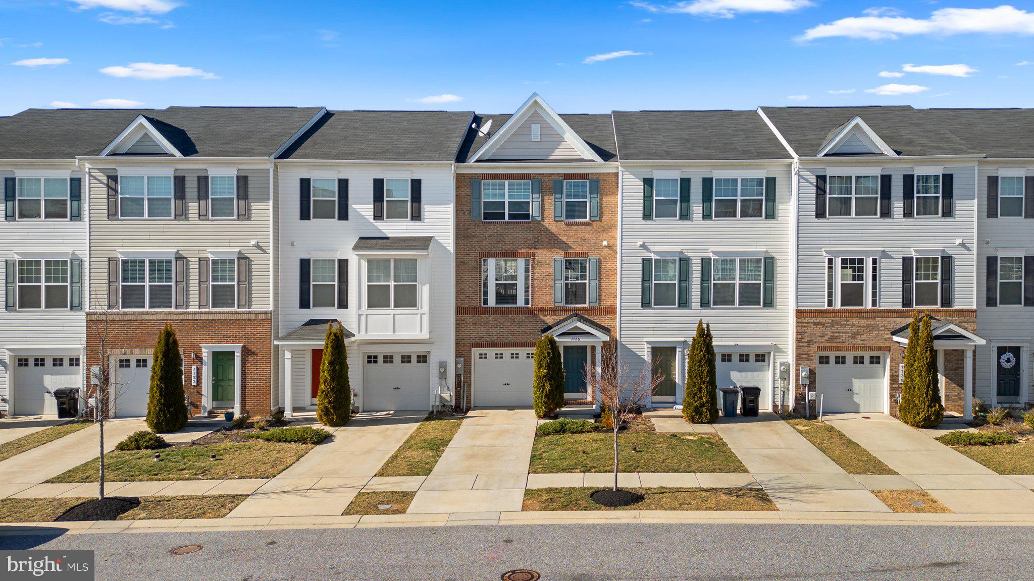 Lovely 3 bedroom 2 full and 2 half bath brick interior townhome with 1 car garage on level lot at Admiral's Landing in Dundalk. Enter front door to first level carpeted family room with half bath and direct access to backyard. Second level has carpeted living room, dining room, kitchen, half bath and provides access to raised deck off living room. Kitchen has LVP flooring, gas stove, granite countertops and 10 foot island. Three carpeted bedrooms on third level. Primary bedroom has private bath plus full bath off hallway. Easy access to 95-895-695. Must See!!!