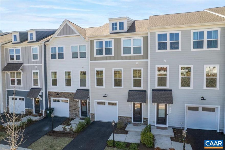 Built in 2023, this 3-story townhouse is located in the popular Pleasant Green neighborhood. With over 2,200 finished square feet, this "better than new" gem stands out with four bedrooms (a full guest suite downstairs) rather than the usual three BR floor plan. Features include a bright, sun-filled, open main level that opens onto an expansive rear deck, 3 1/2 bathrooms with upgraded tiling & fixtures, and a one-car garage. Awesome views of mountains and sunsets from the rear deck and primary bedroom suite! The customized kitchen includes enhanced soft close birch cabinetry, under lighting, and carrara marmi quartz counters. Ideally situated across from the community park with a playground, basketball court, open green space, and a clubhouse complete with fire pits and grills! Located within a 10-minute walk to downtown Crozet, this home affords a walkable lifestyle while being nestled against the Blue Ridge Mountains. Walk to get coffee at Mudhouse Crozet, pastries from Praha, rooftop cocktails at Bar Botanical, yoga, and more. Within an 8-minute drive, you have access to miles of wooded trails and a fishing pond in the Mint Springs Valley Park. Claudius Crozet Park with a pool, dog park, gym and pickleball is even closer!,Quartz Counter,White Cabinets