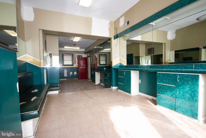 BACK  TO ACTIVE , CONTRACT FELL THROUGH !! MAJOR PRICE UPDATE!! INVESTORS  DELIGHT OR SELF EMPLOYED !!  TWO  BUILDINGS  FOR THE PRICE OF ONE. FEATURING   SPACIOUS TWO  FRONT UNITS  SPACE FOR RETAIL,OFFICES,CHURCHES,BARBER/BEAUTY SALON, ETC. TWO RENOVATED  UPPER LEVEL  RENTAL UNITS, TOTAL OF 2 FULL& 3 HALF BATHS WITH 4 METERS .LIVE  UPSTAIRS  AND  WORK  DOWNSTAIRS (LIVE WHERE YOU WORK OR RENT OUT)