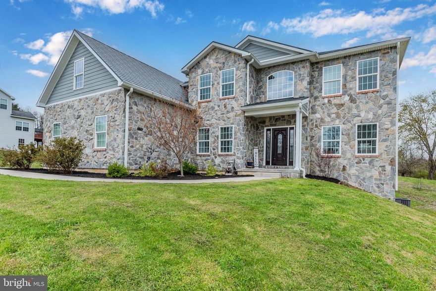 Welcome to this impeccably maintained home located in Lower Paxton Township. Built in 2017, this detached residence offers over 3,100 sq.ft of luxurious living space, with an additional 1,400 sq.ft available should you choose to finish the walk-out basement, which has exterior wall framing and electrical rough-ins already complete.  Upon entering the front door of the inviting two-story foyer, you'll be greeted by high ceilings, warm corners, and an open floor concept. The main floor features a spacious family room, an elegant formal dining room, and a large kitchen with a generous island and gourmet range – a dream for any aspiring chef. Additionally, the main floor features a versatile office that could serve as a potential bedroom, a full bathroom with a walk-in shower, a convenient mudroom, and a layout perfect for both comfortable living and effortless entertaining.  The second floor offers a generous owner's suite, three additional bedrooms and two additional bathrooms, and a large bonus room that could easily be used as a fifth bedroom, playroom or home gym. For added convenience, the laundry room is also located on this floor.  Outside, you'll find a large patio and nicely sized yard, providing the perfect backdrop for outdoor activities and relaxation. The home is complemented by an oversized side-entry 3-car garage, offering ample space for vehicles and storage, and features natural Pennsylvania stone, James Hardie siding, and a lifetime metal shingle roof. Don't miss the opportunity to explore this exceptional home – call today to schedule a viewing!
