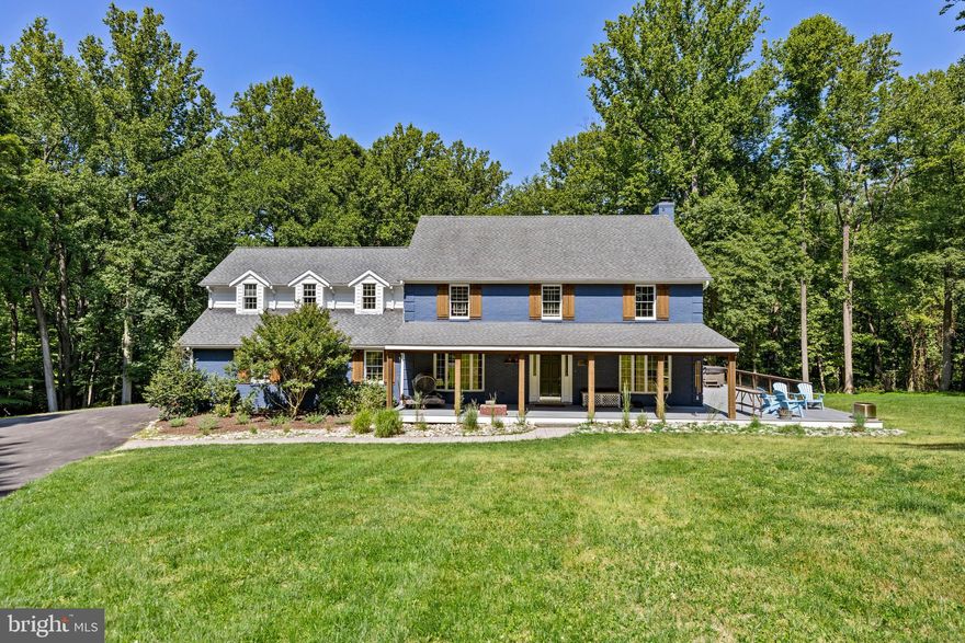 "TUFTON FARMS"  Tucked Back on 6+ Acres Sits a Beautifully Maintained Southern Style Colonial with  a Great  Wrap-Around Porch - Gracious Foyer, Living Room, Formal Dining Room, Family Room with Fireplace  -  Handsome Kitchen  with Large Center Island, Granite Counters, SS Appliances & Breakfast Area - Laundry on Main Level -  4 Bedrooms, 2/1 Baths - Primary Bedroom  w/Spa Bath, Office, Tons of Closets Plus a Huge Walk In Closet -  3 Additional Bedrooms & Hall Bath - Unfinished Lower Level w/ Walkout -  2 Car Garage - Screen Porch, Hot Tub & Shed - Partially Wooded &  Level Back Yard - Great location just off the Falls Road Corridor!