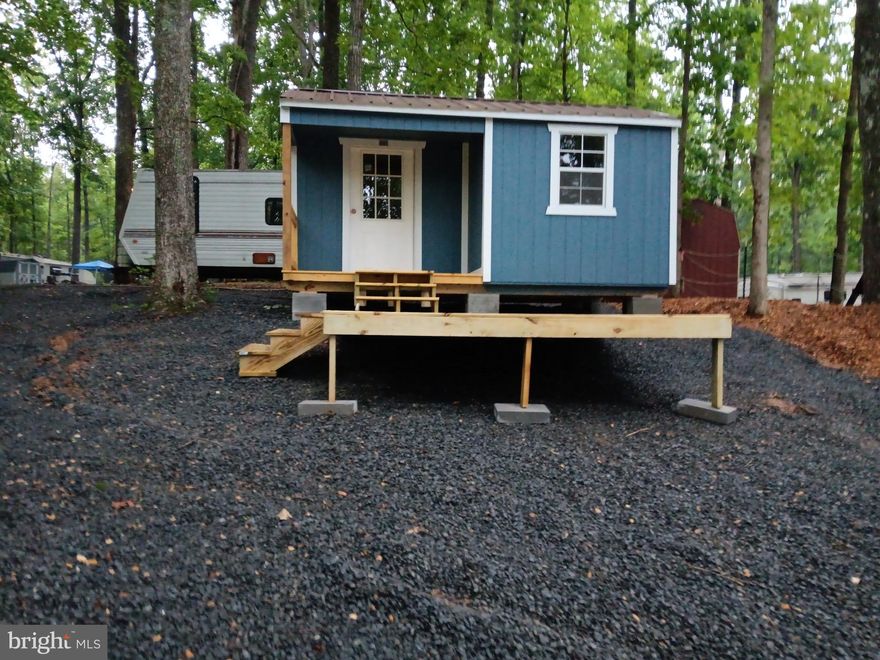 This beautiful Lot is located in Indian Acres Camping Club Of Thornburg Virginia. This Property is just a few minutes from the up and coming Kalahari Resorts  & Conventions.

This property has had a few trees removed, was leveled and has fresh gravel. Ready for enjoyment. The property is right near one of the main bodies of water allowing a peaceful and tranquil Experience.

The Shed (Electricity Included), Trailer and Golf Cart are sold separately. Please contact the owner for more information. Shanekqua Rivera. 540-321-8878 (Text First)

An appointment is required to view this property. This is a gated community; ID is required. Please contact Indian Acres directly for the updated yearly fee and information about the process and amenities. Indian Acres Information Line 804-402-6723