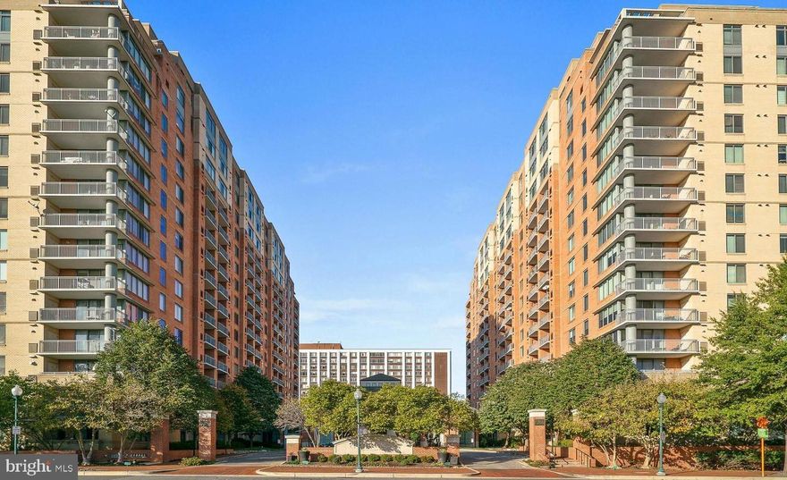 OPEN HOUSE CANCELLED** Multiple offers. This tastefully updated spacious 2 Bed 2 Bath Residence offers appealing modern elements coinciding with an optimal floorplan in a prime location! The Bedroom suites are thoughtfully located in opposite wings allowing for privacy. Floor to ceiling windows and sliders illuminate the unit with natural light enhancing the generous Living and Dining areas, also the wide plank Hardwood Floors, the Fireplace draped in porcelain tiles and other touches throughout. The attractively renovated kitchen features modern high gloss white cabinetry, quartz counters, stainless steel appliances, chic hardware, and LED lighting. The Primary Suite is generously sized, adorned with wall sconces and complete with a large ensuite Bath and a generously sized Walk-in Closet. The unit's bright roomy second Bedroom, also displays sconces, has 2 Closets and an adjoining full Bathroom. The Laundry closet features a recently updated stacked Washer and Dryer. The foyer is inviting with recess lighting and closet space. Enjoy the courtyard views or peer out to the action at Pike & Rose from your balcony. This condo comes with a Garage Parking spot and a cherished additional Storage Unit! The Gallery is an amenity-rich building, featuring an inviting Community Lounge/Party Room with Fireplace, Kitchen and  Bar, Billiards Room, Library, Conference Room, well-equipped Gym and Locker Rooms, manicured Courtyard with seating areas, sparkling Pool and Business Center. Residents also enjoy access to Concierge services with a staffed front desk seven days a week, and a pet-friendly community. This incredible location places you in the heart of it all, providing easy access to a myriad of conveniences, including incredible restaurants, shops, entertainment options at Pike & Rose steps away! Also, the Metro, and Grocery stores, all a quick walk. Don't feel like leaving the building? No problem, there is a market right downstairs. 270/495/Downtown Bethesda, minutes away. Noteworthy, this in one of the best managed buildings in the area, which is reflected in the low condo fees!