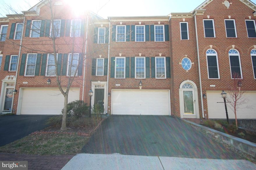 Fantastic opportunity to live in this amazing townhome! The lower floor has a rec room, 1/2 bathroom, utility area with laundry, and a walk out to the 2 car garage. The garage has plenty of storage space as well as a second refrigerator. The main level has an enormous open living room with 3 sided gas fireplace, 1/2 BATH,  and a formal dining area. The large kitchen is drenched in natural light, has all new flooring installed 12/2025 and has plenty of room for an eat in dining table. The large island provides ample prep space for the most experienced of cooks. The upper floor has a large, open master bedroom with a huge master bathroom with soaking tub and separate shower and walk in closet anyone would love. The upper floor also has an additional full bathroom in the hallway and 2 additional large bedrooms. The driveway is large enough to park 2 additional vehicles if need be.