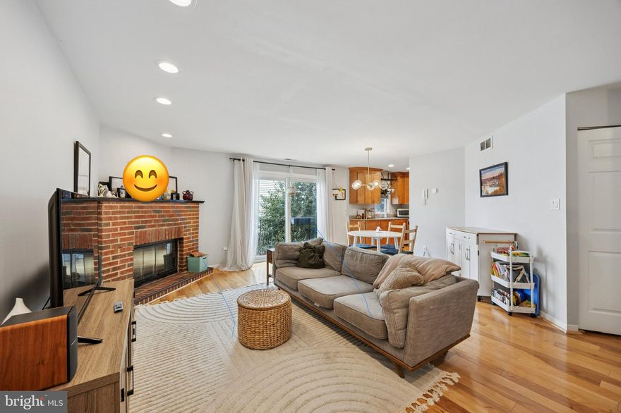 Fantasic Bella Vista condo is now available!   Located behind a secured community gate, this bi-level townhouse style features tons of natural light, a private GARAGE, a wood burning fireplace, roof deck, and low monthly dues.   The kitchen features granite countertops with ample cabinets and stainless stain appliances.   The kitchen flows into a combined living and dining room area with a wood burning fireplace and west facing Juliet balcony.   Just off the kitchen, there is the ultility room with washer and dryer and all mechanic systems.   The upper floor includes the primary bedroom with an en-suite bathroom, and spacious 2nd bedroom with a full bathroom in the hallway.    Continue upstairs to your private roof deck with incredible city views, makes great for entertaining.    The garage is detached and can be entered from Sheridan St.  There is also access from the garage into the property courtyard.  Take advantage of all the shops and restaurants in the neighborhood.  Easy access to public transporation.