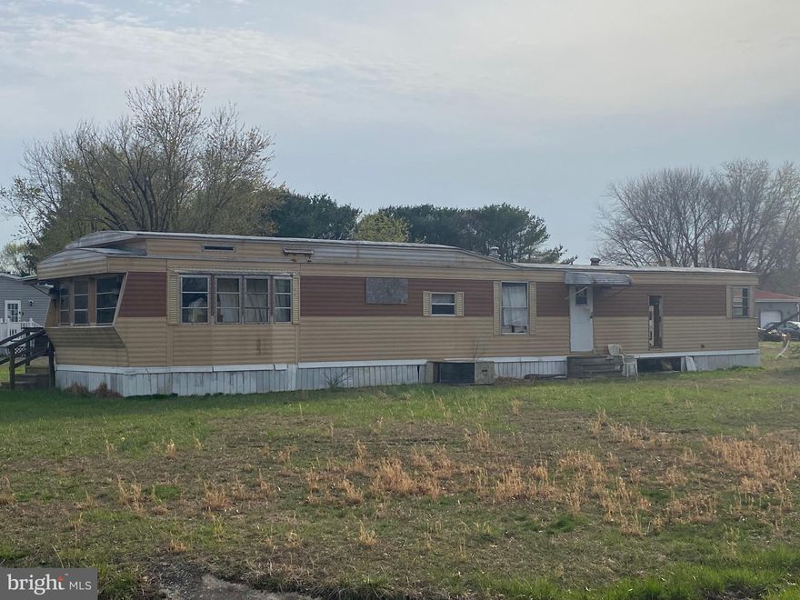 Investor Alert! Estate Sale – Sold As-Is. Located in the quiet rural community of Colonial Acres, this singlewide mobile home sits on its own spacious corner lot. This estate property offers a great opportunity for a buyer with vision—use it as a primary residence, rental, or future homesite. Surrounded by countryside charm yet within reach of town amenities! Make offers!