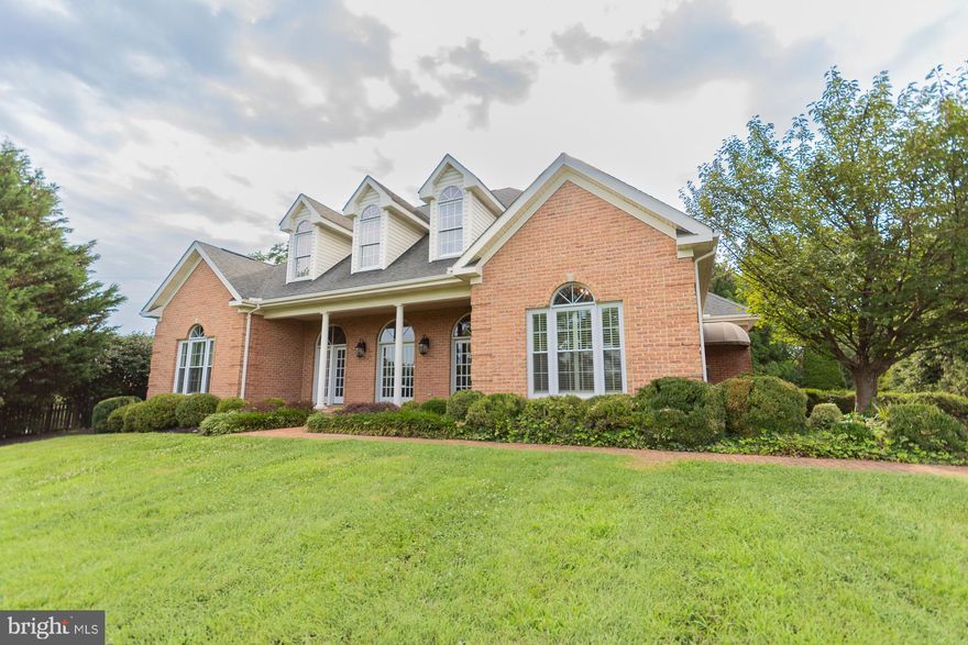 **A Custom-Built Masterpiece Like No Other**

Welcome to a truly extraordinary home where timeless craftsmanship meets luxurious living. This stunning custom-built estate is brimming with incredible features and elegant touches that elevate it far beyond the ordinary.

From the moment you step inside, you'll be captivated by soaring 10-foot ceilings, dramatic interior and exterior columns, vaulted family room ceiling, and a breathtaking mezzanine overlook from the second floor—each detail thoughtfully designed to impress including built in cabinets next to fireplace and on the second floor.  New stainless kitchen appliances and so much more.  The home flows seamlessly into outdoor living, featuring an elegant outdoor fireplace, a private hot tub oasis, and a striking black aluminum fence framing the property with style and security.

The garage is so nice that it feels like finished sq ft and features a half bath with water softener and storage shelves.  An amazing compliment to the 3463 Sq Ft of the house.

A perfectly functioning goldfish pond, complete with *two* cascading waterfalls, adds a serene and magical touch to the beautifully landscaped grounds. Three impeccably constructed garages, built with special brick, offer both beauty and function—an ideal space for car enthusiasts, hobbyists, or storage.

Situated on an unrestricted lot with panoramic views and surrounded by natural beauty, this home offers both privacy and possibility. Whether you're entertaining under the stars or relaxing in luxurious solitude, every corner of this residence speaks of quality, comfort, and sophistication.

This home doesn’t just have it all—it redefines what "having it all" looks like. Come experience beauty, elegance, and one-of-a-kind living. This is the dream home you've been waiting for.