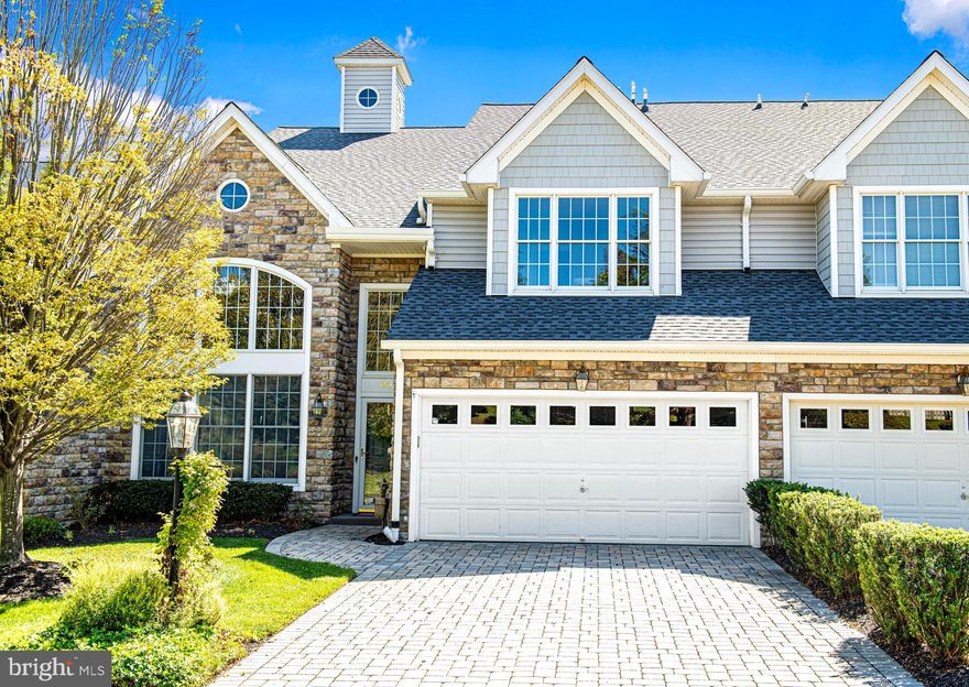 STUNNING WATERFRONT VILLA WITH A MILLION DOLLAR VIEW!  WELCOME TO THE BEAUTIFUL WATERFRONT GATED COMMUNITY OF WATERS EDGE NESTLED ON THE SCENIC BUSH RIVER. WITH AN OPEN CONCEPT FLOOR PLAN, YOU ARE GREETED WITH VIEWS OF THE WATER FROM THE MOMENT YOU STEP INTO THIS MAGNIFICENT HOME. THE LIVING ROOM FLOWS SEAMLESSLY INTO THE DINING ROOM, KITCHEN AND FAMILY ROOM WITH FUNCTIONALITY AND ELEGANCE. THE BUILDER,  KNOWN FOR HIS DISTINCT ARCHITECTURE AND  TIMELESS CRAFTSMANSHIP,  WILL NOT DISAPPOINT WITH THE EXQUISITE MOULDINGS, CUSTOM MILLWORK  AND UNIQUE TRAY/ COFFERED CEILINGS IN THIS HOME.  OWNERS SPARED NO EXPENSE WHEN THEY REMODELED THE KITCHEN, WHICH SERVES AS THE HEART OF THIS EXQUISITE HOME. THE STUNNING KITCHEN IS A CHEF’S DREAM, BOASTING AN OVERSIZED QUARTZ ISLAND, DISHWASHER WITH DOUBLE DRAWERS, TWO OVENS, ONE WITH AIR FRYER MODE AND A MICROWAVE THAT ALSO SERVES AS AN OVEN.  AN ABUNDANCE OF CABINETS OFFER PLENTY OF STORAGE AND A BEAUTIFUL STONE BACKSPLASH HAS BEEN CARRIED INTO LIGHTED CABINETS, OFFERING AN EXCEPTIONAL AND STUNNING ACCENT! FAMILY ROOM FIREPLACE HAS STONE SURROUND AND UNIQUE LIGHTS, ADDING A CALMING AMBIENCE TO THE FAMILY ROOM. SOARING CEILINGS, CURVED STAIRCASE WITH IRON BALUSTERS, AND GLEAMING HARDWOOD FLOORS ARE JUST A FEW OF THE INCREDIBLE FEATURES OF THIS HOME. TWO PRIMARY BEDROOMS, ONE ON EACH LEVEL, BOTH HAVE WALK IN CLOSETS AND BREATHTAKING VIEWS! A LUXURIOUS REMODELED PRIMARY BATH FEATURES THE LATEST TREND WITH A WALK IN DOORLESS SHOWER, DOUBLE VANITIES AND BEAUTIFUL GRANITE COUNTERTOPS. A THIRD BEDROOM AND FULL CERAMIC BATH COMPLETE THE UPPER LEVEL. THIS HOME HAS BEEN LOVED AND CARED FOR BY THE OWNER WITH ROOF AND TWO ZONE HVAC REPLACED WITHIN LAST TWO YEARS. THIS GORGEOUS HOME IS BEING SOLD FURNISHED! ENJOY THE MANY AMENITIES THIS WONDERFUL COMMUNITY HAS TO OFFER WITH A CLUBHOUSE, POOL, FITNESS ROOM, WALKING TRAILS, PUTTING GREEN AND A KAYAK/CANOE STORAGE AREA, ALL WITHIN STEPS AWAY. WATERS EDGE IS LOCATED IN A GREAT LOCATION CLOSE TO APG, 95, AMTRAK, SHOPPING AND RESTAURANTS! THIS HOME IS TRULY ONE OF A KIND!