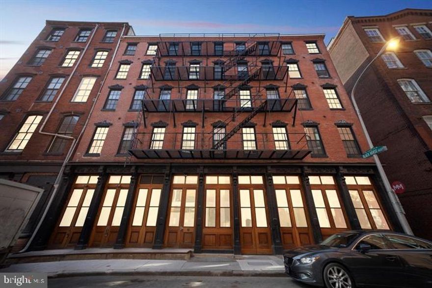 This stunning, almost 3,000 square foot, three bedroom, three and a half bath condo with den/office was recently built out in 2018 and has 9 full years left on the tax abatement (commenced Jan 2019)!As you enter into this beautiful spacious  home, you will be blown away by it open living space,  tons of natural light and well designed floor plan. This amazing home features custom and designer finishes throughout, recessed lighting, beautiful matte finish wide plank floors throughout, a wall of windows with views of the city skyline, custom closets, automated shades and more. You could not ask for more storage in this home! The large kitchen features a large breakfast island/wine fridge/unbelievable amount of cabinets/quartz countertops/upgraded appliance package and more. The expansive living area offers large west facing windows with city views also seen from the kitchen. The stunning master includes a gas fireplace and great sized outdoor patio, and an en suite master bath with heated floors/large soaking tub/large shower and separate toilet room. All of the other large bedrooms include stylish ensuite bathrooms. Just off the living area in the hallway you will find a perfectly located powder room. If you have an affinity for modern industrial then this home is a must see. This is a warm and welcoming home that would be parallel to having a sprawling ranch in the suburbs, except it is in one of the most popular neighborhoods in the city! Walking distance to coffee shops, excellent restaurants, nightlife, public transportation and subway, major thoroughfares and bridges, easy access to I-95 and steps away from what will be the new Penn s Landing park project. This $225 million dollar park project will cap I-95 and offer tons of new green space all the way to the Delaware River. This could potentially increase the value of the entire neighborhood over time. Schedule your appointment today.