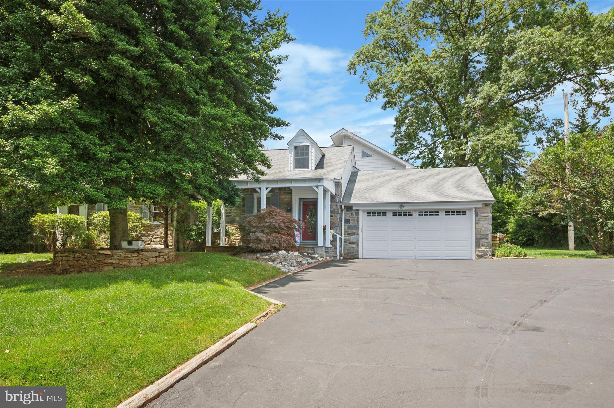 Beautifully Updated and Expanded Stone Cape Cod style home in the Bethayres section of Lower Moreland Twp, Home has been lovingly maintained by current owners and shows pride of ownership. Main level features foyer entry, Large living room with h/w flooring, built ins and stone F/P, Dining room with built ins and coffered ceiling, modern chef's kitchen with 5 burner dual fuel commercial gas range/electric oven, stainless steel appliances and loads of cabinetry, breakfast bar with seating for 4 stools and breakfast area which fits a large table. Kitchen overlooks a large family room addition (2008) with stone F/P and built in cabinetry. Access from the family room to large hardscaped patio overlooking picturesque grounds. The main level also features a 1st floor primary bedroom with primary bath, 2 additional bedrooms and a ceramic tile hall bath. Upper level features a huge primary bedroom, a dressing area/closet area, a 2nd large closet and a luxury primary bath with a whirlpool tub, stall shower, toilet and linen cabinet. The primary suite also features has a wood burning stove, skylights and access to a large private deck overlooking the beautiful rear grounds. The upper level has an additional 2 room suite with it's own private bath. The lower level/basement is partially finished and is a great recreation/play area and features a brick floor to ceiling wall. The laundry is in a separate laundry/utility room. Floor plan of this lovely home is very flexible and can accommodate multi generational needs and possible in-law suite. 2 zone heating/air conditioning, 2 F/P's and wood stove on 2nd floor primary suite, 2 car attached garage with access to house. Driveway easily holds 5 cars in addition to the garage. Seller is including a 1 Year Buyer Protection Plan for additional peace of mind!
Location is phenomenal and convenient to public transit via Septa line and Bethayres West Trenton line into CC Philadelphia. Close to shopping, restaurants and major roads. Located in the highly desirable LOWER MORELAND SCHOOL DISTRICT!!