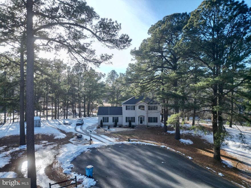 Welcome to your waterfront 1.35 acre retreat in Holiday Harbor—where coastal charm meets everyday comfort. This beautifully maintained 3-bedroom, 2.5-bath home offers the perfect blend of relaxed living and functional space. From the moment you step inside, you’ll appreciate the light-filled interiors, open flow, and thoughtful layout designed for both entertaining and quiet evenings at home. The spacious main living area invites you to unwind while enjoying serene water views. The well-appointed kitchen offers ample cabinetry and counter space, making meal prep effortless whether you're hosting guests or enjoying a quiet dinner in. The adjoining dining area provides the perfect setting for gathering with family and friends. Upstairs, the primary suite serves as a private retreat, complete with an en-suite bath and generous closet space. Two additional bedrooms provide comfort and flexibility for family or guests. A versatile den adds even more value—ideal as a home office, playroom, or easily converted into a fourth bedroom to suit your needs. Step outside and experience the true highlight of this property: direct boat access to the Saint Martins Neck River. Whether you enjoy early morning fishing trips, sunset cruises, kayaking, or simply soaking in the peaceful waterfront setting, this home makes it all possible right from your backyard. With its prime waterfront location, flexible living space, and easy access to the river, this Holiday Harbor gem offers the lifestyle you’ve been dreaming of. Don’t miss your opportunity to make it yours. Professional photos coming this week.