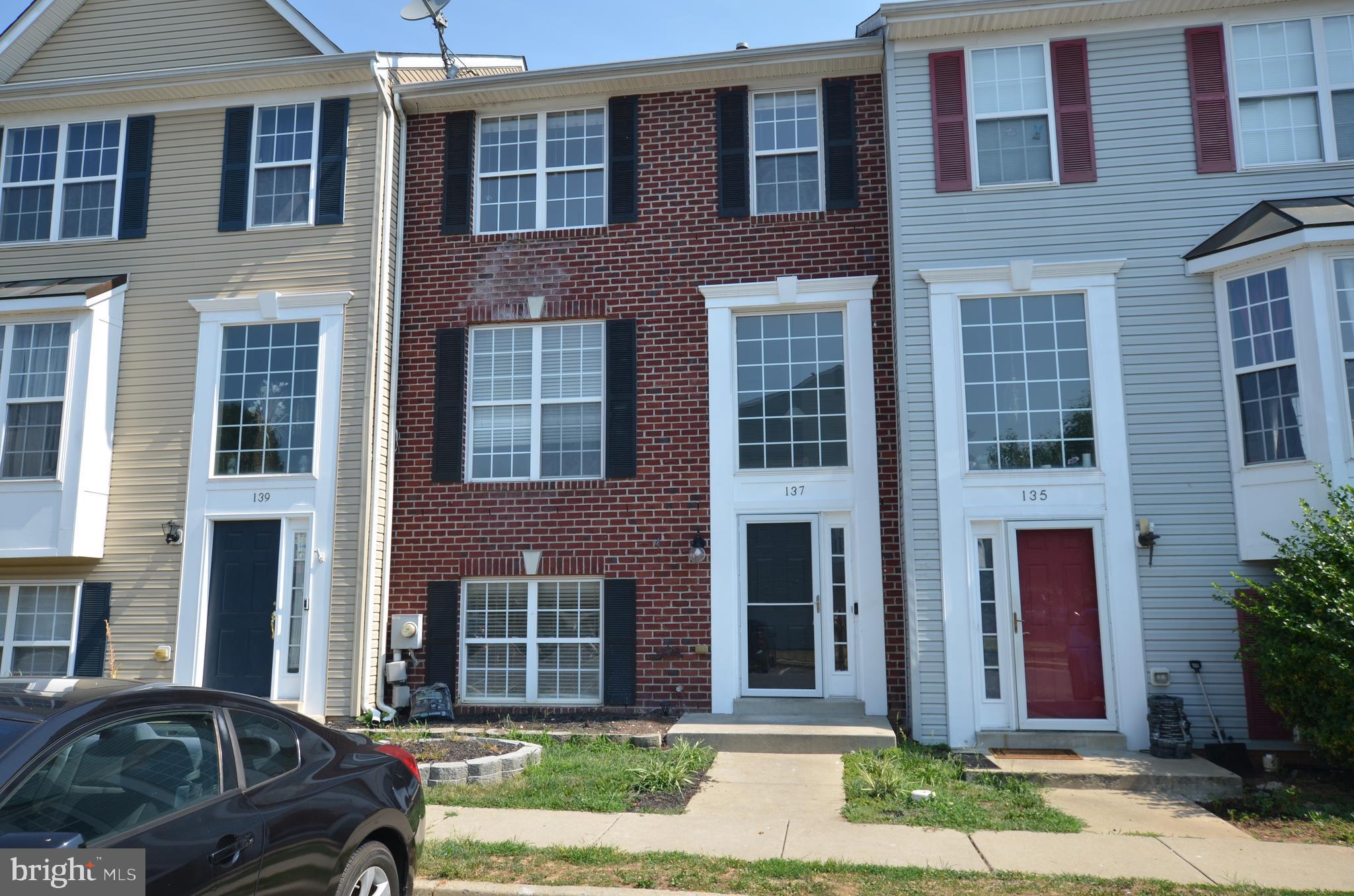 Gorgeous brick front Townhome. 3 above-grade levels. 2 assigned space and plenty of guest parking. 4 bedrooms 3.5 baths. Wood flooring through-out whole house. Exceptional country kitchen with dining, plenty of natural light. Walkout level basement with recreation room, 4th bedroom, full bath, and den. Fenced back yard with nice patio and storage shed. Ready to move in.