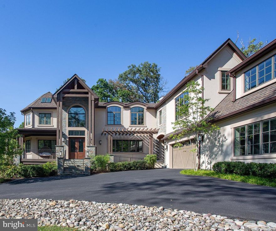 Built in 2014, this stucco and stone home offers approximately 11,000 square feet of living space. Sited on just over an acre, this home features a circular driveway with a gated entrance, four car garage (one with a 22 foot vaulted ceiling for indoor basketball), and an amazing outdoor entertainment space with a built in kitchen, bar seating, and gas firepit area.  The main floor is perfect for today's living with an open family room and kitchen, Travertine flooring, two offices, one of two owner's suites, elevator, laundry room and dog wash station.  The gourmet kitchen features two large islands, two dishwashers, three sinks, top of the line stainless steel appliances and walk in pantry.  The second level offers the second owner's suite with two walk in closets and gorgeous en suite bath, four more en suite bedrooms, a second laundry room, and a large sitting/family room area.  The lower level boasts a large open space for media entertainment, bedroom, large spa bathroom with hot tub and sauna, work out room and a second kitchen.