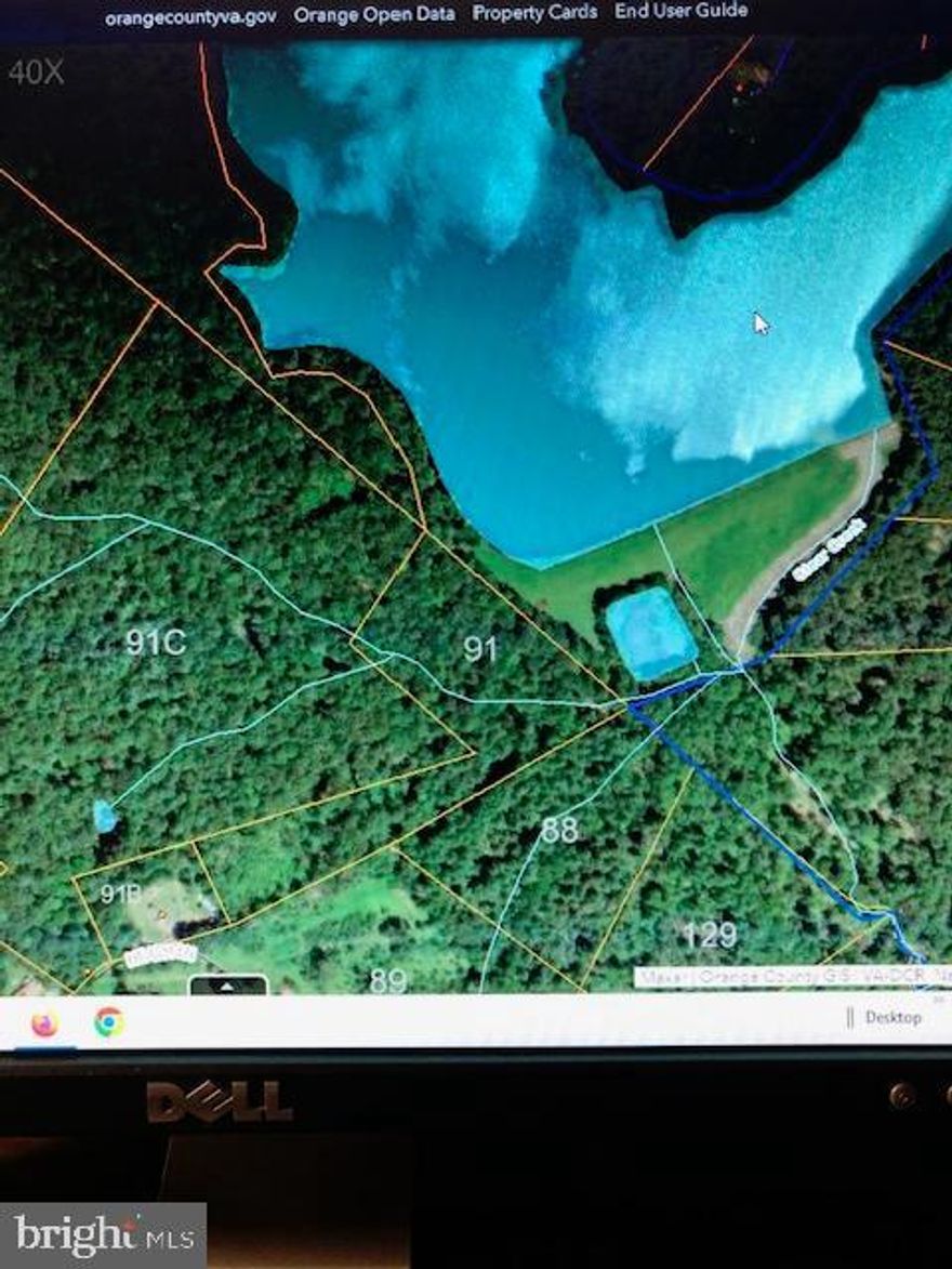 Very private 6 1/2 Acres with water view. Best fishing as featured in Rod and Reel years ago. Trophy fish waiting for your lure. Great house site on a  almost non existent property.  A 50' protective buffer between you and the lake. Lake does not allow gas motors.

Listing agent will assist buyer in soil testing, surveying and feasibility for building while under contract
to purchase. Lister is also  a builder.  Call for details.