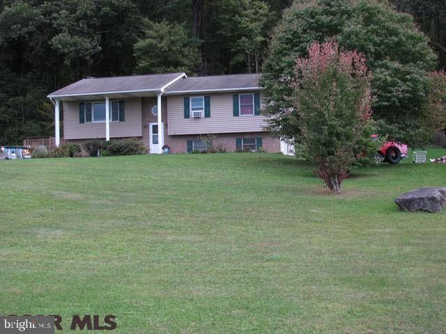 Nice split entry on 1 acre. Average Condition. For Comp Purposes Only.