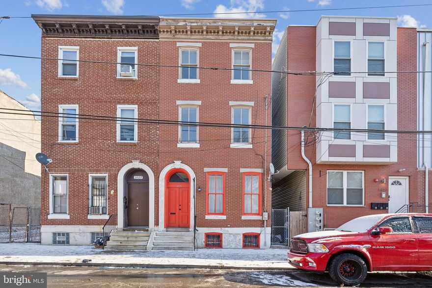 Must see this spectacular upgraded home in the Temple University Area! There is no shortage of space in this expansive four-bedroom property.  Enjoy gorgeous cherry hardwood floors throughout, a modern kitchen with granite counter tops and stainless steel appliances, and a massive back yard situated on an oversized lot.  Both the second and third floors share the same convenient layout.  Each level offers two sizable bedrooms with ample closet space and a full bathroom.  Both bathrooms have been completely renovated with eye-catching tilework and modern fixtures. Even the toilets have special features! Other amenities include Central Air and an efficient tankless hot water system.  Laundry is located in the basement, which offers high ceilings and runs the full length of the house providing for an abundance of storage.  This property is in close proximity to the Broad Street Line and other local conveniences.  Just a few minutes north of booming Francisville, home to various shops and restaurants.  Schedule your tour today!