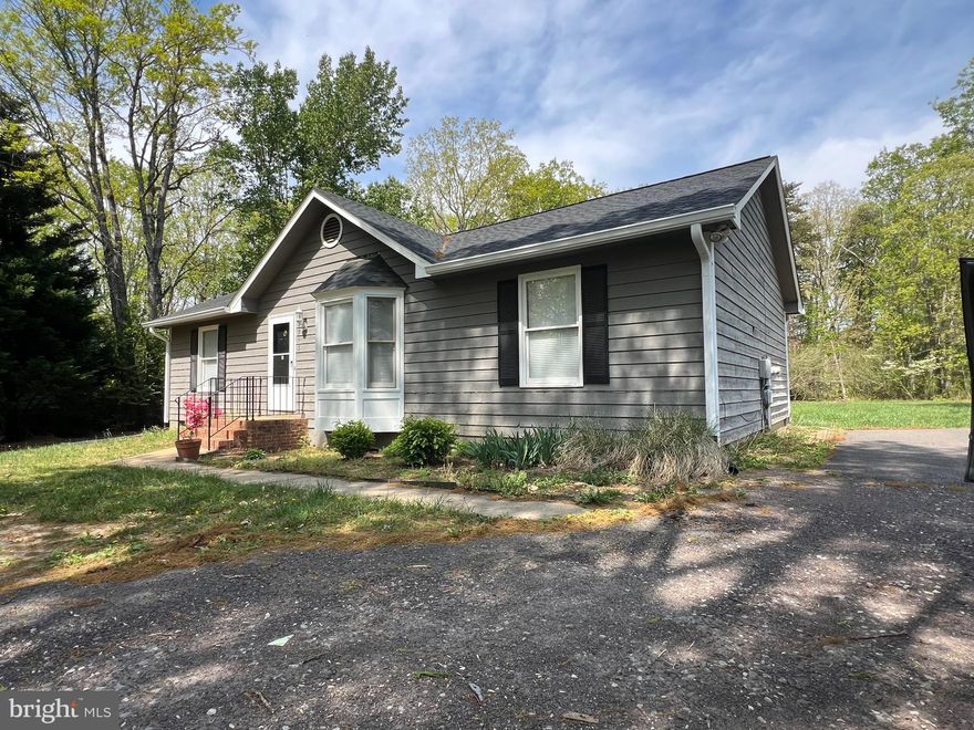 Situated in Lake Wilderness, this home offers single-level living with 3 bedrooms and 2 full bathrooms. It boasts a living room with a bay window and ceiling fans, an eat-in kitchen featuring hardwood floors, and bathrooms that include ceramic tile. The backyard has a concrete patio and a spacious, level lot with a shed. Additionally, there is a large driveway providing ample parking space. Unfortunately, pets are not allowed. 2 year minimum lease required. Washer & Dryer are AS-IS