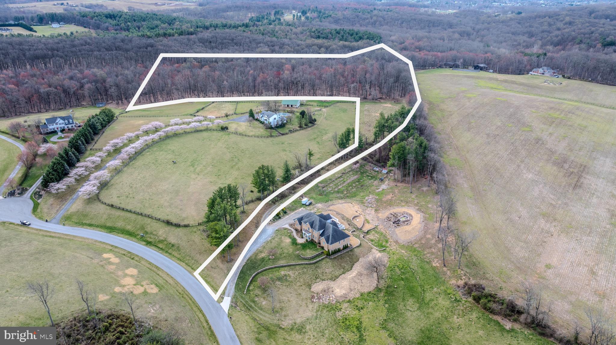 This gorgeous 18 acre lot wooded lot could be the site of your future dream home. Beautiful mature forest. The 7 gallon per minute well is in place, and it is perk approved for 4 bedrooms. Ready to build! Situated in an area of upscale housing, the house location offers quiet privacy. This is truly a once in a lifetime opportunity.
There is fee simple access to the lot over a shared driveway. The driveway maintenance agreement is spelled out on the plat. Please respect the neighbors privacy and don't drive back to the lot without showing permission. Conveniently located close to shopping, restaurants and commuter routes. This property feels remote, yet is close to everything. House/lot packages available with one of our preferred builders or bring your own builder.