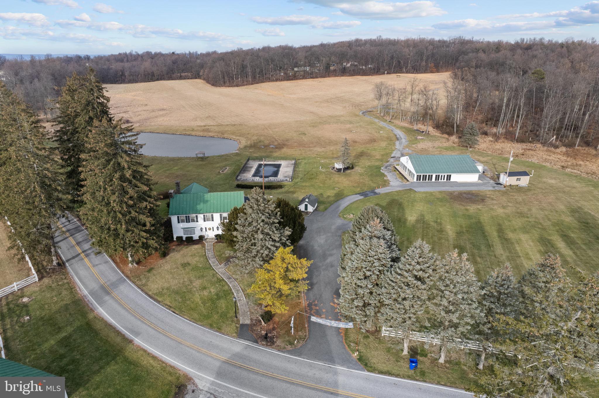 A special opportunity awaits with this historic property turned wedding venue. 120 acres of rolling fields and woods surround a home that has welcomed many past prominent guests. The grandfathered use of the wedding business, as well as the home, pool, pond, banquet hall & barn are being offered for sale. The seller would consider lease terms or owner financing. There is ample parking for guests, walking trails to be enjoyed, and wooded acreage for hunting. Current zoning also allows uses such as campground, golf course, landscaping, greenhouse, B & B, and roadside stand. Multiple sources of income could be added to the existing revenue. And of course there is the option for the home to become owner occupied and enjoyed as an estate. Location is convenient to Rt 83, Pinchot Park, & Roundtop Mountain Resort. Please contact the list agent to discuss this unique property. Showings by confirmed appointment only with list agent to accompany.