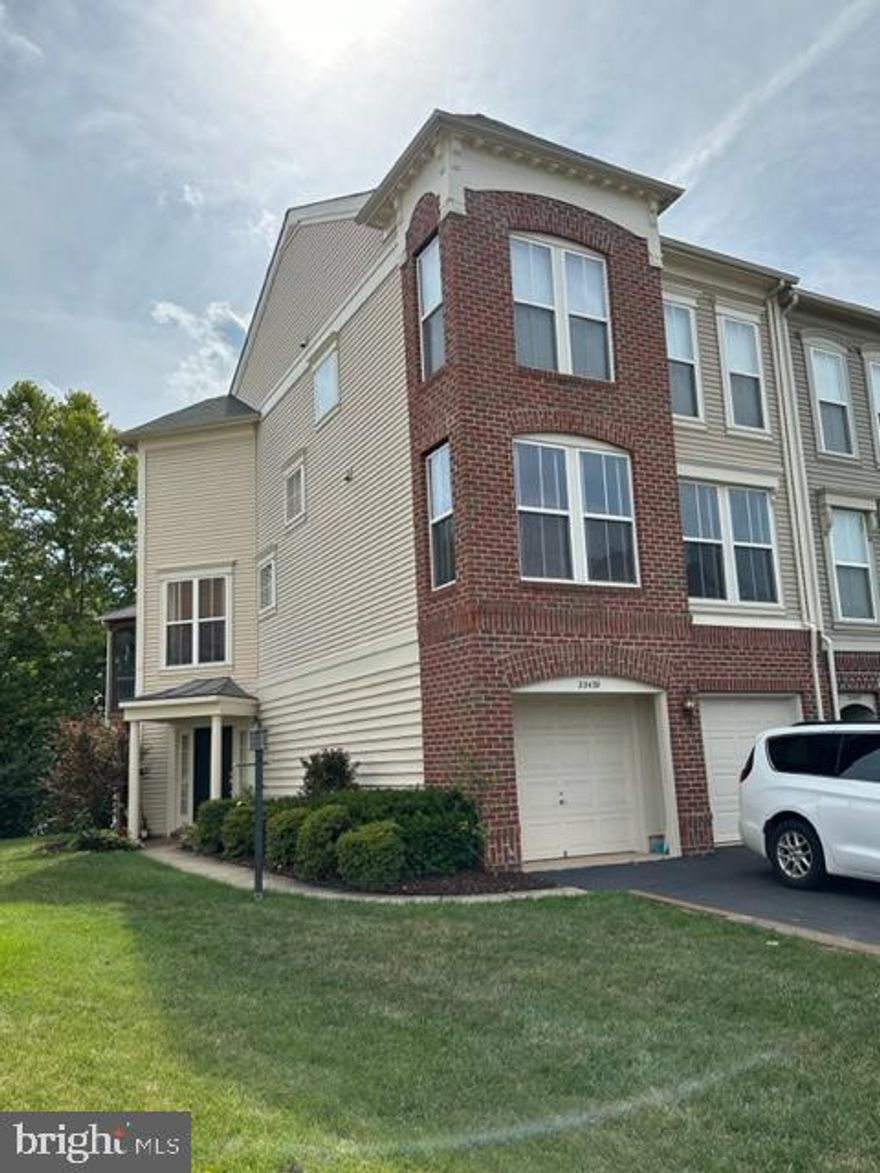 Beautiful and bright, 3 level, 4BR, 3.5BA end unit townhome, features an open floor plan, tons of upgrades/extras, and sits on an oversized lot (backing to a preserve), in the Award Winning Brambleton Community! This one truly stands out and is perfect for entertaining or your own enjoyment. HVAC system and digital/programmable thermostat are NEW as of May 2023! The spacious gourmet kitchen features a large kitchen island/breakfast bar, optional wine rack and cabinets, stainless steel appliances and opens to the family room, complete with gas fireplace, and breakfast nook/desk space. Microwave, cooktop, refrigerator, dishwasher and disposal. Main level also includes dining room with real hardwood flooring. Tons of light come through the premium extra large vinyl clad windows around this house. Family room leads out to the deck (332 sq ft) for grilling. New Trex boards just installed Aug 2023. This "outdoor living room" offers a great view of the back yard and feels like a single family home lot. Note: The property line goes beyond the neighbors fence line by quite a few feet. Upper level of home features a primary suite complete with large sitting/desk area, deep walk-in closet with pull down attic storage area (tall clearance), and large luxury bathroom with soaking tub, and separate shower. Two light filled rooms with extra large windows, another full bathroom, and laundry room complete the top floor. First level includes a 2nd family room/den/office or 4th bedroom, new hardwood flooring, full bathroom, full size windows, and sliding door to patio, as well as the 2 car garage. Garage is complete with all your handy needs including cabinets, storage, and a utility room. The Brambleton HOA features 4 pools (5th one is coming) and 2 club houses to pick from as well as 19 parks, 18 miles of trails and various fishing ponds. Brambleton Golf Club is 10 minutes away. Enjoy other community amenities, events, social activities/functions, block parties, as well as nearby restaurants, retail, grocery stores, and movie theaters. Verizon Fios included in HOA fee! The list goes on! Welcome home to this wonderful townhouse and everything this lovely community has to offer!