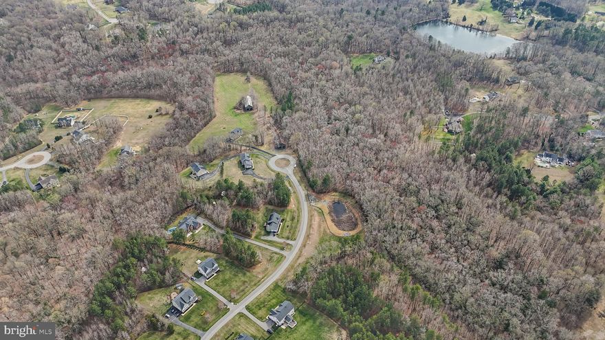 Don’t miss this incredible opportunity to own 25 acres of breathtaking land in a sought-after neighborhood! Perc-approved and ready for your dream home, this private retreat sits at the end of a cul-de-sac and features two existing barns, a serene pond, and a beautiful mix of mature trees.  Call today for more details and to schedule a showing!