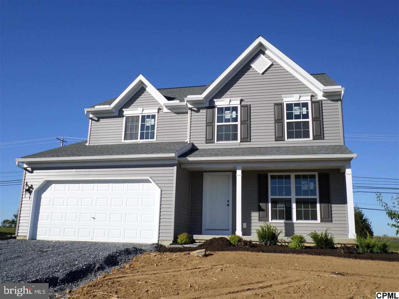 This Bellwoode B 4 bedroom with sunroom addition and 2nd floor living space expansion is under roof and awaits a new homeowner.