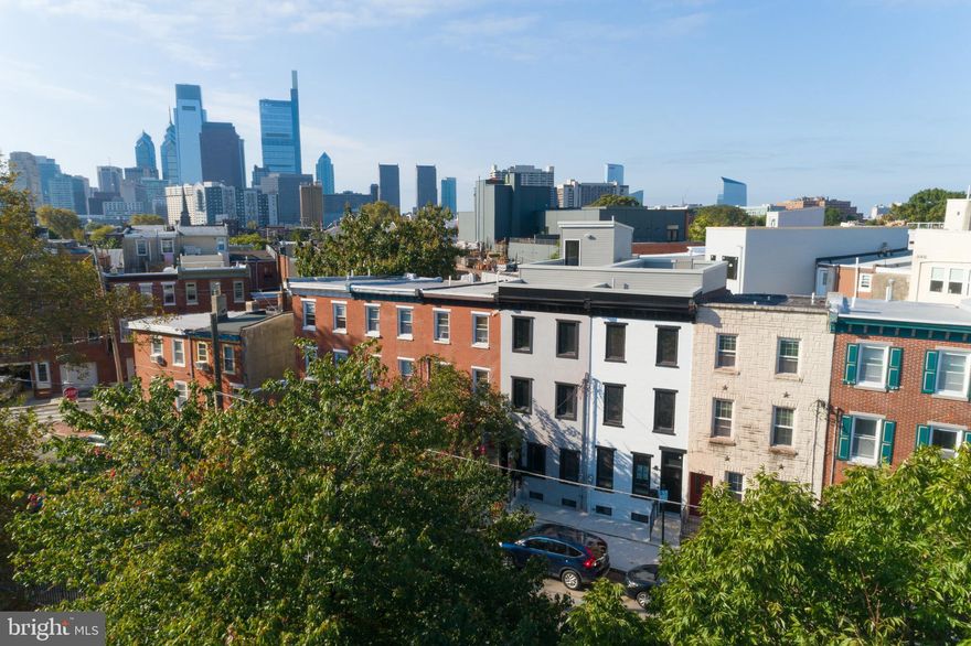 Are you looking for a newly rehabbed home with character, exposed brick, roof deck AND 10 YEAR TAX ABATEMENT; all within walking distance to Whole Foods, Tela's Market & Kitchen, parks/playgrounds, public transportation, The Met Philadelphia, Wine and Spirits, and much more!? Presenting the Shirley Street Twins, two modern farmhouse homes brought to you by one of the area's leading developers, Stamm Development Group. Entering the home, you will be drawn to the exposed brick, floating stairs, Nest doorbell, Sonos sound system (with Sonos Amp) wired throughout the first floor leading up to the rooftop, and 3/4 inch stained hardwood floors. With an open concept floor plan for living, dining, and cooking, this house is set to entertain! All this is complimented by a custom kitchen complete with 42" white shaker cabinets, Carrera quartz counter tops, white farmhouse sink, upgraded GE appliance package with gas range, hexagon subway tile back splash, and counter seating. Heading through the kitchen into your private outdoor oasis, you will find brick pavers and a fenced-in yard with room to landscape. Downstairs, you'll be impressed with high ceilings and a full shower allowing the space to be used as an in-law suite, play room, or den! Moving upstairs to the second floor, you'll find two full bedrooms each with custom closet organizers and recessed lighting, plus a full tiled bathroom with tub and shower! Conveniently located in the hallway is your laundry room with barn door and linen closet. Finally, the third floor boasts a master suite, featuring a walk-in closet with custom closet organizers, and a large master bathroom which itself features marble tile, a double vanity sink, and a Delta rain head shower. The master suite leads directly to a 10x15 interior den; easily convertible to a closet, office, or additional storage area. Taking the spiral staircase up stairs you will find two roof decks with views of Francisville Park and the center city skyline! Schedule a tour today, these Shirley Street Twins will not last long!