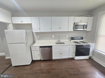 Search 402 N CURLEY STREET BALTIMORE MD 21224