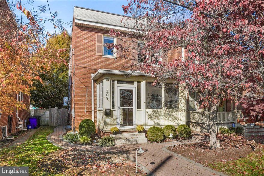 Unwrap This Home for The Holidays! What Better Gift Than This Darling, Downtown Duplex! Encompassed By Vibrant Growth! It’s an Exciting Time to Be Surrounded By This Booming Community! Enjoy Sidewalks Leading to All the Wonderful Activities and Shops That Downtown Has to Offer!  A Newfound Sense of Community Camaraderie!  Meticulously Maintained, This  Home on Monroe is the Perfect Blend of Old Town Character and Charm - Renovated Tastefully with all of the Modern Upgrades for Style and Comfort. Nothing to do but Move In! Uniquely Enclosed Front Porch for Enjoying the Warmth of the Southern Exposure in this All the Seasons Room with added square footage of Living Space- Bright and Sunny Welcoming to Start Your Days! Spacious Main Level Living Room with Warm Hardwood Floors overflowing into the Dining Room. Feel the Warmth from the Large Window in the Creative Use of Space Opening up the Back Area for a Den/Sitting Area with a Glass Door Opening up to  a Huge Fun and Functional Fenced Backyard!  This Private and Manicured Yard leads to two Large Storage Sheds in the Back of the Lot! Both with added Electric for Convenience- One is Currently an Art Studio but the Perfect Makings of a "She Shed" or Man Cave! The other can serve as a Garage for your vehicle. The Back Gate opens to a narrow tract for Off Street Parking. After Enjoying What All the Outdoors has to Offer- Continue Your Tour of the Impeccable Interior of this Home! Painted Neutral Decorator Colors Throughout, Newer Stainless-Steel Appliances and French Quarter Tile Slate in the Kitchen. Downstairs Offers a Large Family Room with Plush Carpet and Recessed Lights. Equally Large Epoxy Sealed Floors in the Generous Utility Room/Laundry Area with Wash Tub. Bilko Doors Lead up to the backyard. Topping This Tour Off the Upper Level Boasts Three Bedrooms with Gleaming Hardwood Flooring, Full Bath. Walk in Closet and Bonus Room is currently used as an Office but Perfect for Morning Workouts or additional Spacious Walk In Closet/Storage. This Quaint Brick Home is Professionally Landscaped Complimented with a Paver Walkway. Hurry, this GEM will not last long!