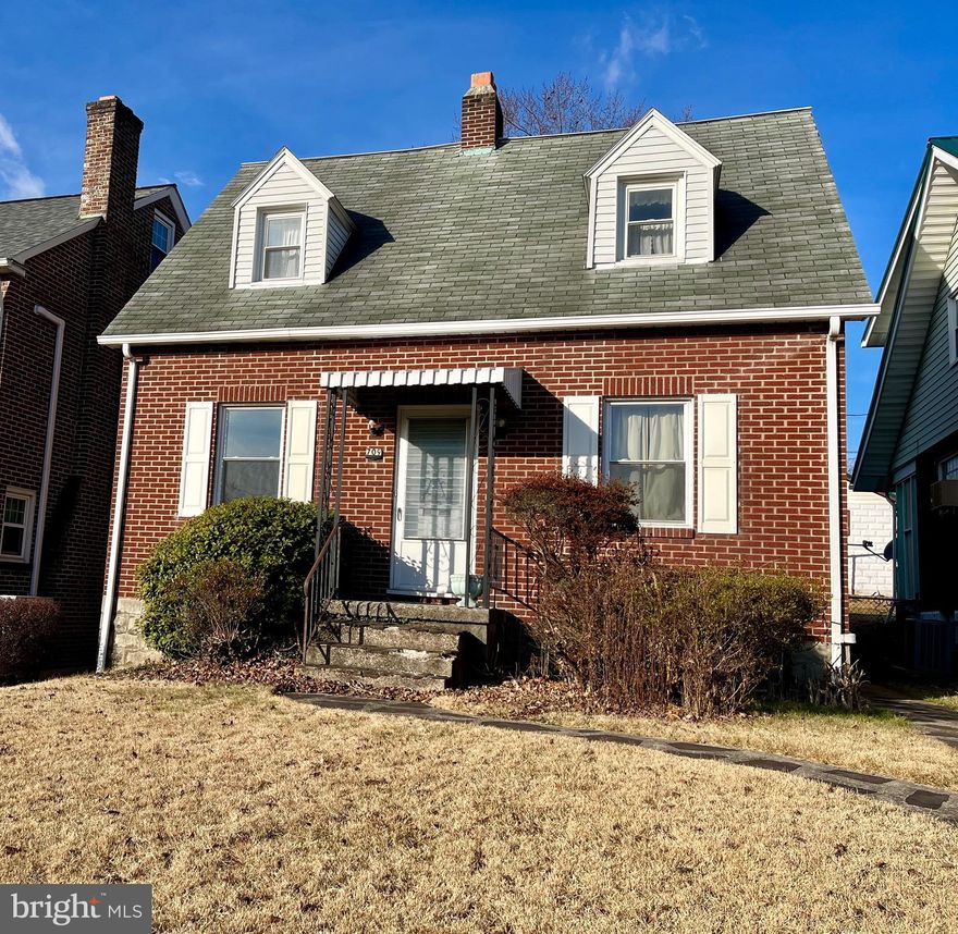 You can be the proud owner of a brick Cape Cod in Johnson Heights—one of Cumberland's most popular neighborhoods— for less than a rent payment!
Main floor—a spacious living room with hardwood floor, fireplace, mantel and built in bookshelves, entryway coat closet, kitchen with gas stove, and separate dining room.  Upstairs has 2 nice bedrooms with hardwood floors, and full ceramic bath.  The full basement adds a retro rec room and the utility/laundry area with plenty of storage space. The charm of 1940's style is on display in the living room, the bathroom and the arched doorways.  Modern comforts include Central air and newer gas furnace.  Vinyl replacement windows. A clear termite report is on file.  This quiet neighborhood is very convenient to Fort Hill High School, Washington Middle School and UPMC. With just a few weekends of TLC, you will be proud to call this home your own!