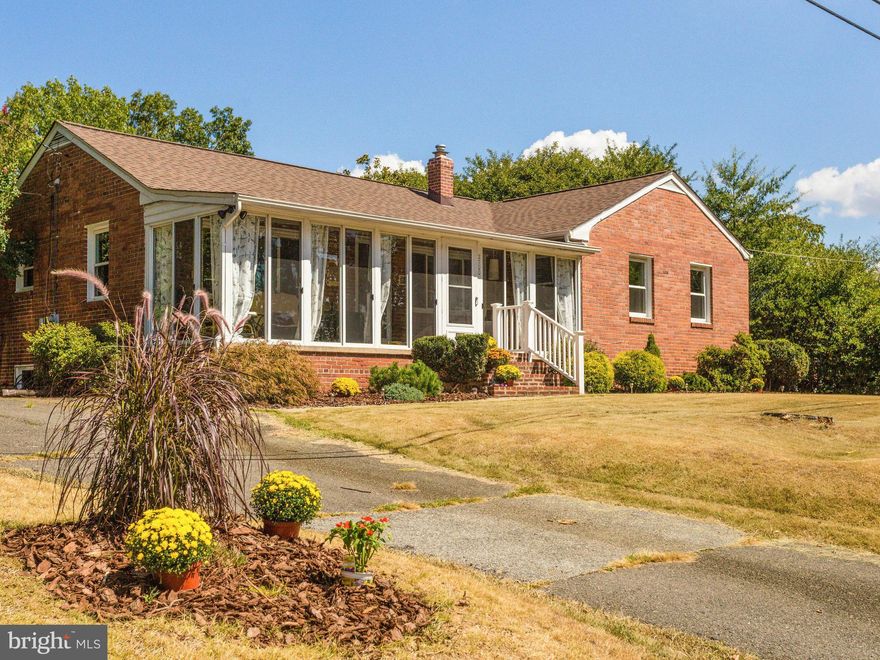 Large Attractive Rambler with Big Front Porch in Excellent Location! Less 0.3 Mile Huntington Metro Rail Station! Near Historic Old Town Alexandria with Fabulous Shops & Wonderful Restaurants! Close to The  Scenic Potomac River! Easy Commute to Downtown DC. 4 Bedrooms, 2 Full Updated Bathrooms, Updated Kitchen! Fresh Paint. LR. Dining Room. Big Recreation Room! Deck in Fenced Yard! New Windows!..