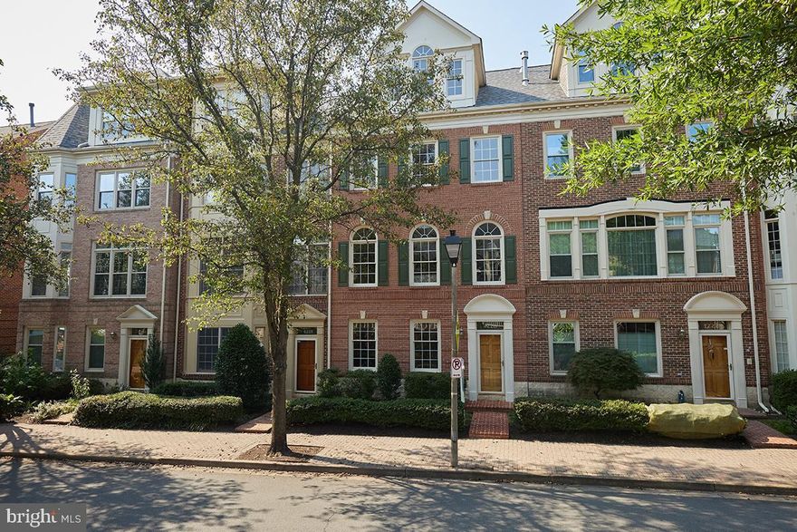 Welcome Home!  4220  11th ST N is sited on a quiet, tree-lined street, just a short stroll to Ballston Metro.
Mature landscaping and brick walk lead to the raised six panel wooden front door.  Inside the bright entrance hall there are generous closets, a 4th bedroom with en-suite bath,  and staircase to main living level.  This level boasts 10' ceilings, and gleaming hardwood floors.  The south-facing kitchen has recent stainless appliances and granite countertops, a breakfast bay and casual space for shared culinary activities.  The family room opens to an intimate deck.  Formal living and dining is in the front of the house, and enjoys a gas fireplace in cooler seasons.  The owner's suite occupies the entire third level.  This retreat offers a separate sitting room, gas fireplace, bright bathroom with soaking tub and separate shower, and cavernous closet space.  Laundry is also on this level.  The upper floor has two additional bedrooms and a shared bath.  Original owners have meticulously maintained this property.  The roof and both HVAC systems have been recently replaced.