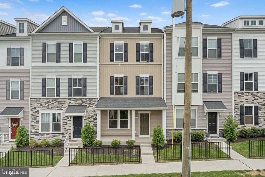 Don't miss this beautiful, nearly-new home in Old Town Ashburn! 3BR/3.5 BA with tons of upgrades and an 8' extension on the back. Gorgeous chef's kitchen with upgraded cabinets, appliances, quartz counters and a huge island, perfect for entertaining.  Primary suite features a stunning bathroom, sitting room, huge closet and a private, covered porch. Two additional upstairs bedrooms share an upgraded hall bath. Upstairs laundry room and lots of closet space. Lower level features large recreation room with a full bath. LVP throughout lower and main levels.  Huge garage with room for storage. Conveniently located steps from the W&OD trail, shopping, and a wide variety of dining options. This home is pristine and move-in ready. Per builder, actual square footage is 2315.