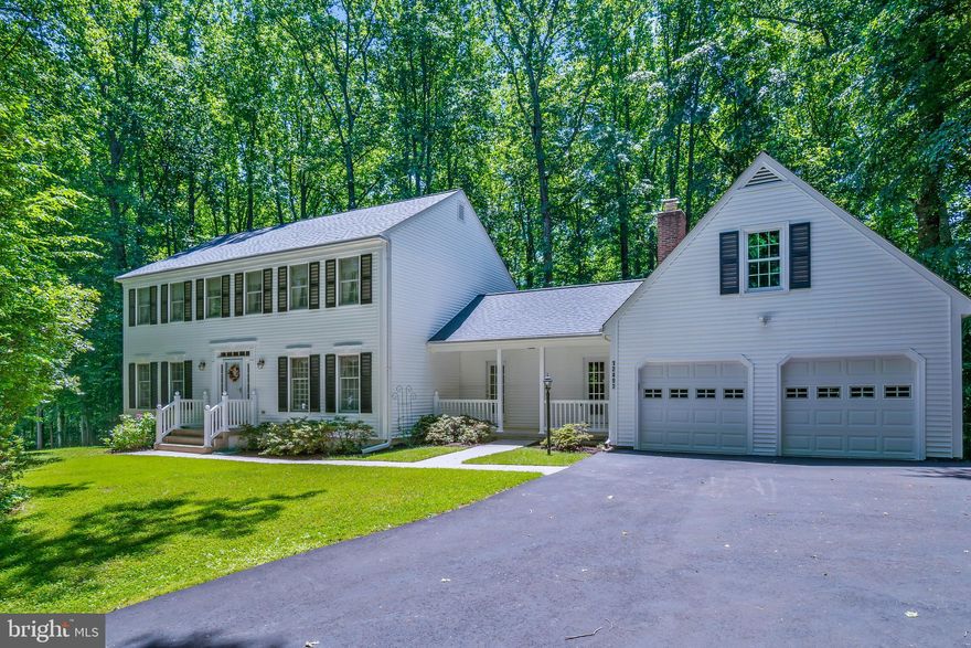 Swoop in on this classically beautiful home before it's sold. Located in the coveted Lynwood section of Lake Ridge, it's tucked away on a private lot but not out of reach from NoVa lifestyle and commuter points north. The traditional style home features spacious formal living and dining rooms along with a generously sized study. Open kitchen hosts corian counters, stainless appliances and a large island for added  storage.  Off of the breakfast nook is the multi-level deck, perfect for dining al freco and hosting guests. The home backs to trees and greenery, creating a private oasis not far from town. The spacious family room has a gorgeous brick surround fireplace and hearth, waiting for your decorative touch. Off of the family room you'll access the covered breezeway to the two car garage. On the upper level you'll find the owner's suite complete with two closets, a dressing area and an ensuite bathroom.  The three upper level bedrooms are well appointed with standard closets.  Shared hall bath, linen storage and the home is already set up with an upstairs laundry closet. The lower level is fully finished with a rec room, 5th bedroom, full bathroom, 6th bedroom/den (NTC). The basement space is perfect for your in-home classroom, exercise room, play room or in-law suite... The rec room has a flat walk-out to the patio.  Secondary backyard access through the oversized storage room, which is set up as the laundry room as well. Siding, roofing, garage doors, kitchen appliances HVAC have all been replaced in recent years. This sweet home is turn-key and ready for best life living. 

Lifestyle awaits in Lake Ridge.  5 swimming pools, splash pad, tennis courts, pickle ball courts, basketball courts, volleyball,  boat ramp, playgrounds/tot lots, sport fields, county trails. HOA also includes trash/recycling pick up.