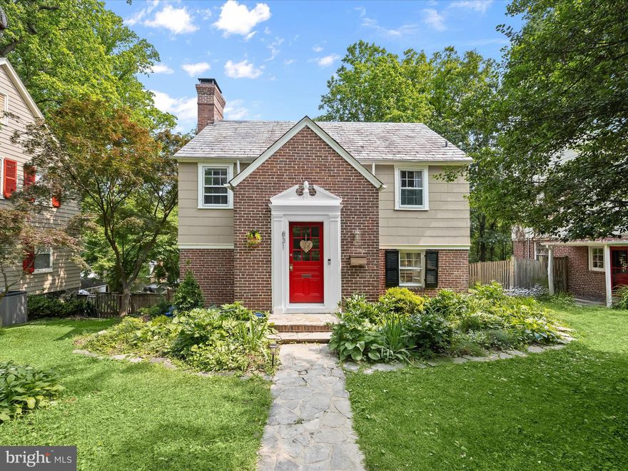 Nestled in the historic Hunting Ridge neighborhood, this three bedroom home offers charm inside and out, surrounded by lush greenery and mature trees. Hardwood floors and upgraded lighting add warmth throughout, beginning in the inviting living room with its cozy wood-burning fireplace. French doors in both the living and dining rooms open to a patio that overlooks the fully fenced backyard and tranquil parkland beyond. The brand new kitchen features quartz countertops, a navy tile backsplash, stainless steel appliances, and soft-close 42” cabinets. Hardwood flooring continues upstairs, leading to three comfortable bedrooms and a beautifully updated full bathroom with a tiled tub-shower, linen closet, and stylish accent flooring. Downstairs, the unfinished lower level includes laundry, storage space, and a half bathroom. A detached one-car garage with electricity offers added flexibility and is perfect for a gym, workshop, or creative studio. Step outside to enjoy the peaceful surroundings, where the sounds of nature and the beauty of the landscape create a perfect setting for relaxation or outdoor gatherings. Recent improvements include kitchen and bathroom renovations, fresh paint throughout, upgraded electrical in most rooms, new lighting fixtures and more. Additionally, within the past three years upgraded infrastructure include fiber optics, water lines/mains, and natural gas lines. Located in Hunting Ridge, one of Baltimore’s CHAP’s historic districts, this home enjoys the serenity of nearby Gwynns Falls/Leakin Park, with over 1,000 acres of woodland and the second-largest urban forest in the U.S. Whether you are looking for a quiet nature walk or a quick commute, you will find both at your doorstep, with downtown Baltimore, major highways including I-70, I-95 and I-695, BWI Airport, and Amtrak and MARC trains nearby. It is a lifestyle that feels tucked away, yet effortlessly connected.
