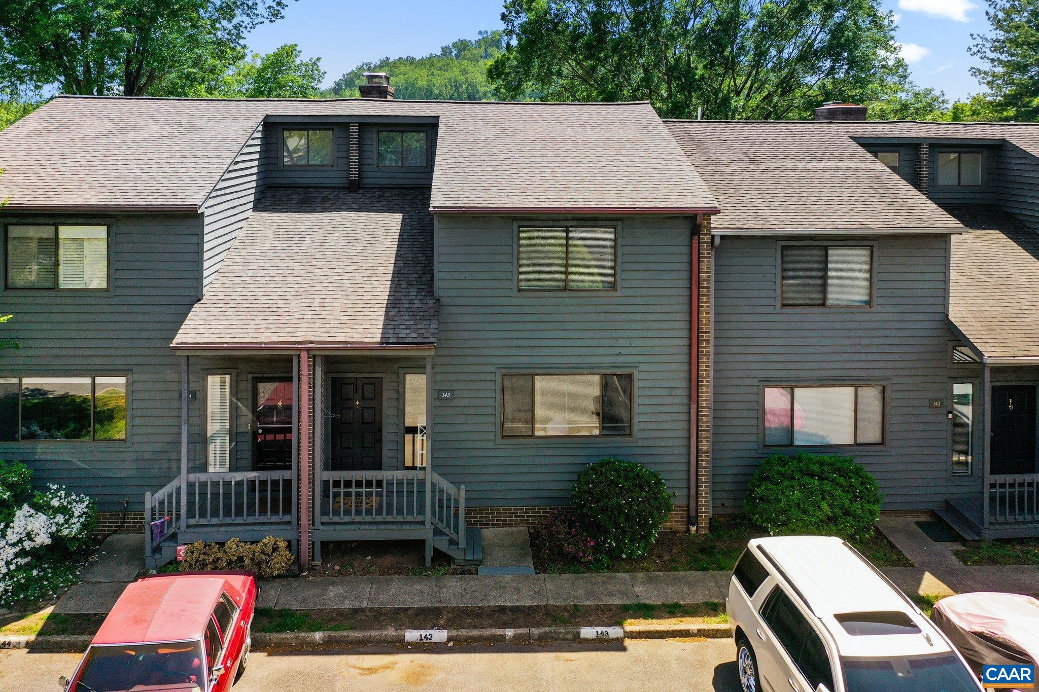 Huntington Village. 2 bedrooms, 2 1/2 bath unit featuring a freshly painted interior, newly renovated kitchen, with increased ceiling height, new cabinetry, new granite surfaces and stainless appliances. New LVP flooring throughout the main and upper levels. Primary suite offers private deck. Home has 2 brick fireplaces. Large rear patio with private wooded view. Close to UVA, JAG, Business School, shopping and much more. Unfinished basement has the ability to add a bedroom, and full bathroom, with direct access to exterior,Granite Counter,White Cabinets,Fireplace in Basement,Fireplace in Den