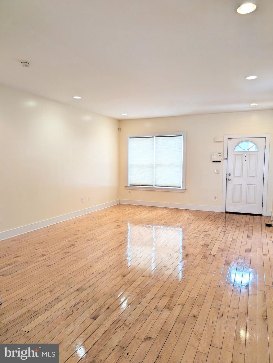 Entering the spacious living room with open floor plan. The kitchen filled with granite counter tops, custom cabinetry, and a stainless steel appliance package. Walking up to the second floor there are 2 huge bedrooms with over-sized closets and a full luxurious marble bathroom. The 3rd floor boasts 2 more bedrooms that are just as big as the 2nd floor, walk in closets, laundry, and another bathroom with a jacuzzi tub and a beautifully tiled stand up shower. The main stairwell has giant skylight that brings in tons of natural light that will fill up the home's interior. Finished basement is extends the entire length of the house. There is ample storage space and energy efficient mechanicals. Photos are from previous listing.