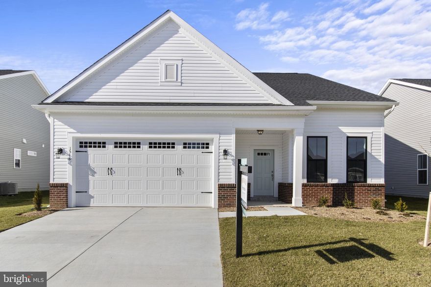 Brand New Home in a Brand New Community for adults 55+, is now under construction for Fall move in!! 
This Picasso comes with a loaded kitchen including Gourmet Stainless Steel Appliances, white cabinets and Carrara Morro Quartz counters. The family room has added windows providing an abundance of natural light and is open the kitchen and dining area. At the rear of the home, a screened in porch has been added for an additional relaxation space as it faces the mature trees in the back! 
The spacious primary suite is also in the rear of the home and features two closets, and large en suite with dual vanity sinks, linen closet, and shower. 
Additional highlights of this main level include two secondary bedrooms, full bath, a large laundry room and a 2-car garage. 
The Lower Level with 9' ceilings also has a finished Rec Room and Full Bath for extra living space.
Located within The Crest at Linton Hall, a new Brookfield Residential community for adults that are 55 or better! Community includes 2 pickleball courts, bocce, horseshoe pit, community garden, covered outdoor kitchen with seating area plus a paved trail to Broad Run Regional trail system! 
Closing cost assistance is available! Be one of the firsts to call The Crest at Linton Hall, home!
Photos are of a similar home and to show floorplan only as home is still under construction