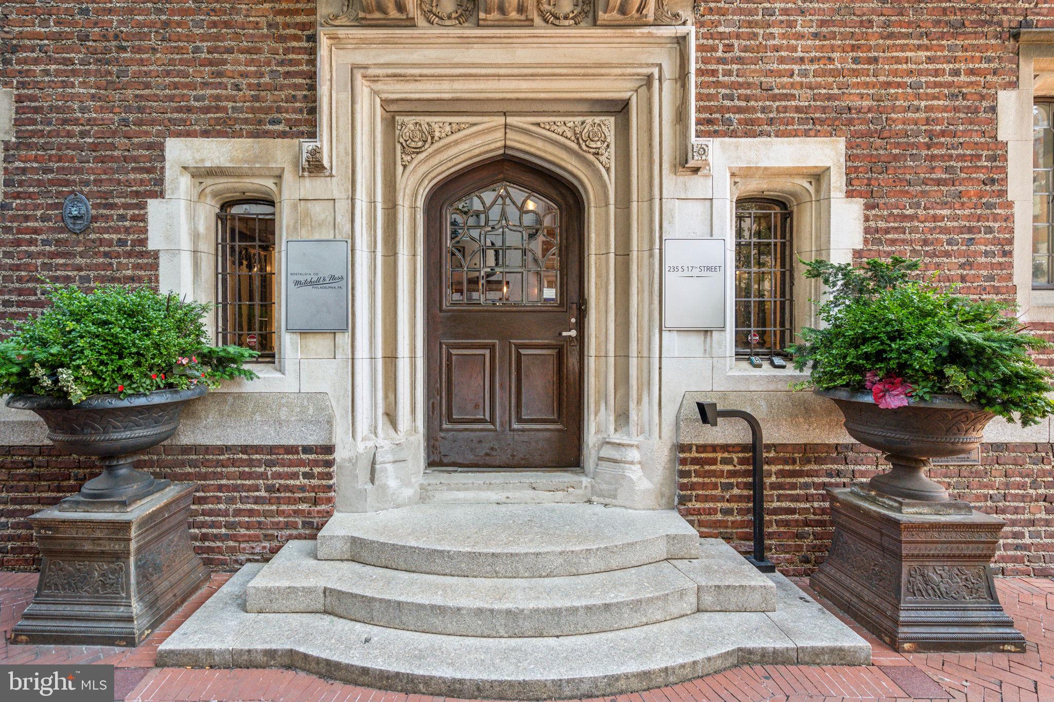 Entire building on a prime corner in the Rittenhouse Square neighborhood of Center City. The building is perfect for a private club, retailer/showroom, restaurant or corporate office. Located one block from Rittenhouse Square and less than one block from Rittenhouse Row’s Walnut Street, the building is located in the city’s best shopping, dining and high-end residence area. It is only a few blocks to the Market Street and Broad Street office corridors, and provides easy access to Septa and PATCO. The space was most recently used as a national retailer's corporate headquarters. The entrance to the space is on 17th Street.
The Rittenhouse Square neighborhood, ranked by Places Rated Almanac as
the 6th best neighborhood in North America, is home to a meticulously landscaped open space park and more than 175 restaurants and 199 retailers within a three block radius. There is over $2 billion of real estate around The
Square. The Avenue of the Arts is a quick 3 block walk, the Market Street office corridor is a mere 3.5 blocks, and there is easy access to Amtrak’s 30th Street Station, the Philadelphia International Airport, and all major regional
thoroughfares and transportation hubs.
In 1893, banker and financier Charlton Yarnall commissioned architect Frank Miles Day to design he and his wife a city house that would beat out any other in the neighborhood. Day’s design—a four and a half story, 35 room, 18,000 square foot Collegiate Gothic Revival mansion—made the other nearby Rittenhouse Square mansions seem like oversized carriage houses. At one point there were murals by the artist Violet Oakley—the first woman to get a public mural commission for the Pennsylvania State House—in every dome, pendentive, lunette and octagonal panel she could find. The murals were called The Building of the House of Wisdom and told the story of the rise of education and knowledge; they quickly became the talk of the town and the envy of every other wealthy family. When the house went up for sale in 1927, the public was concerned that a new owner would destroy them. To prevent this, the Philadelphia Republican Women’s Club purchased the house and made it their headquarters, calling it the “Hannah Penn House” in honor of William Penn’s wife.
By 1940, the building was in poor condition and sold to the Philadelphia branch of the United Service Club, another female-founded organization. The son of the original architect was commissioned to design a remodel. The United Service Club was like a YMCA for enlisted men. Throughout the 1950s and 1960s the Yarnall House was the local American Red Cross.
In 1973, the house was converted for the Institute of Paralegal Training and the murals were removed and put on display in the Chestnut Hill Museum where they still reside today.
The Yarnall House was used as law offices in the 1990s, then became the Urban Outfitters headquarters, then used as the headquarters of an advertising agency where the old dining room was used as the company’s conference room, and today is the headquarters of a national sports retailer.