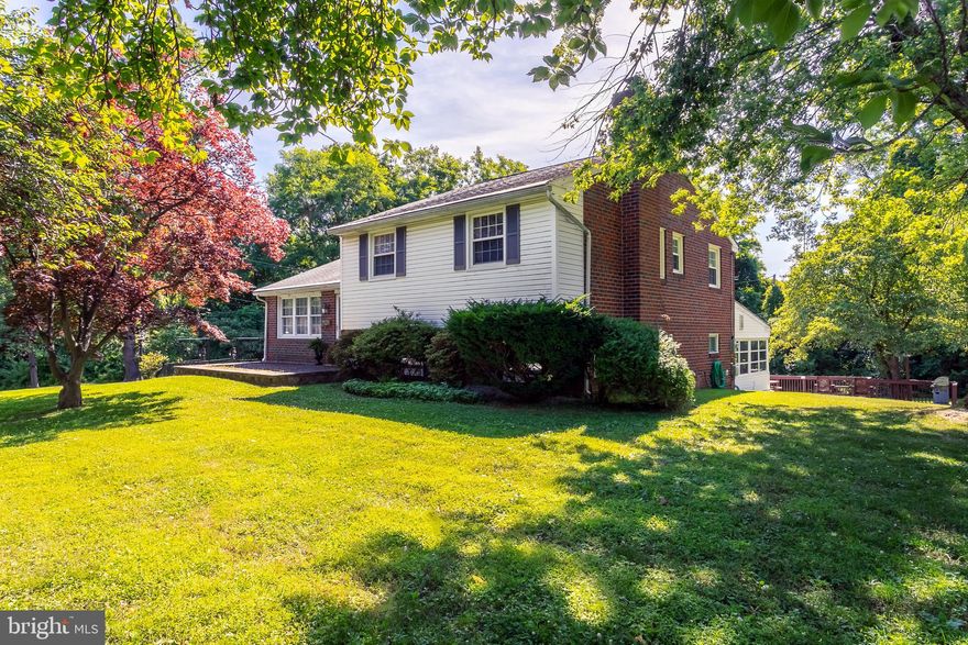 An incredible opportunity to own a very loved and well cared for home in the coveted neighborhood of Sproul Estates.  This spacious 3 bedroom, 2 full and 1 half bath split offers close to 2,000 square feet of living space, a cul de sac location, large private drive, front porch and great backyard with deck.  The home backs up to green space for a nice private feel.  The home is believed to have its original oak hardwood floors under the carpeting!  The first floor offers a large and naturally sun lit living room that opens directly into the dining room.  The kitchen was renovated a while back but it was custom and even has a sub zero fridge and freezer!  The 2nd floor has a master bedroom with full bath, hall bath and 2 other nicely sized bedrooms.  The lower level has a large recreation room with brick surround fireplace and newer carpeting.  The lower level also has a great 2nd kitchen and half bath.  The built in garage is a rare find in Delaware County!  The backyard is large and lush.  The current family has owned the home for decades and have loved it so much.  A special home with great square footage and room to customize!