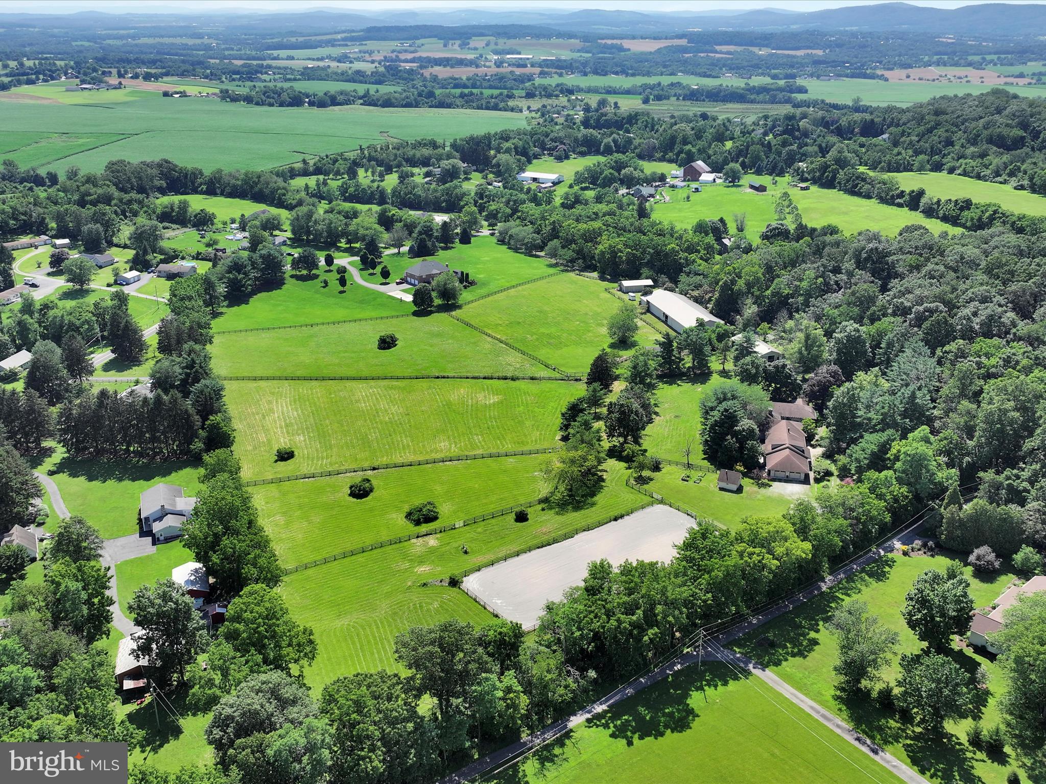 Note:
Property was temporarily off market for the installation of the new sand mound which was planned since early summer. A new electrical panel and new gutters were also a pre-planned project.
Equestrian Estate in Northern York County! The equestrian facility and breathtaking home will meet even the most decerning horsemen's approval! Enjoy your horses year-round with the indoor arena you've always dreamed of and a view of your barn and pastures from your kitchen, dining, living room and primary bedroom's patio's.
Upon entering the property, follow a long, tree lined lane. Beautifully set at the top of the property is a picturesque tree lined field with a fenced riding ring with all weather footing.
Beside the ring is the massive 5600 sq. ft. sprawling ranch home that is made for entertaining! Upon entering the home is free standing fireplace to an open concept kitchen and dining room and a separate living room. The well-equipped chef's kitchen showcases a massive custom hickory and granite island, two sinks, a double oven and a commercial sized refrigerator. The primary bedroom has lots of natural light and an ensuite bath. There is a large second bedroom with a jack and jill bathroom.
In 2008, a 2400 sq. ft. addition was built as a secondary suite. It has a separate entrance, open concept living room, kitchen and dining room with radiant floor heating. The focal point of the room is the central fireplace. The secondary suite has a first floor bedroom and completely ADA compliant bathroom. An elegant staircase leads to a second bedroom/loft space and a second bathroom. A generator system feeds the well, barn, indoor, and master bath.
From the home it is a short walk to a 4-5 car parking area and the stable and pastures. The stable has 9 large stalls, tack room, wash stall with hot and cold water and a feed room. The barn areas and pastures are all fenced and gated by Ever Green Fence out of Lebanon. automatic waterer in the pasture.
From the stable, continue along the paved walkway to the Indoor Arena (65' x 120") sand footing and mirrors and a 50' x 65' open area at one end more stalls or hay storage (holds 1800 small bales or 40 large).
Next stop is an 18' x 40' pole barn with an open bay is perfect for parking equipment, additional stalls, and storage. There is a separate two stall barn in a paddock.
Please contact listing agent if you are not currently working with a buyer's agent and would like to schedule a showing.
Travel Time:
HIA (31 min))
BWI (1hr 40 min)
IAD (1 hr 50 min)
PHL (2hrs)
Downtown HBG/Amtrak (30min)
Downtown Baltimore (1 hr 30 min)
Lancaster PA (1hr)
Frederick MD (1 hr 5 min)
Swan Lake Stables (40 min)
Diamond 7 Ranch and Arena (7 min)
Penn National Race Course (50 min)