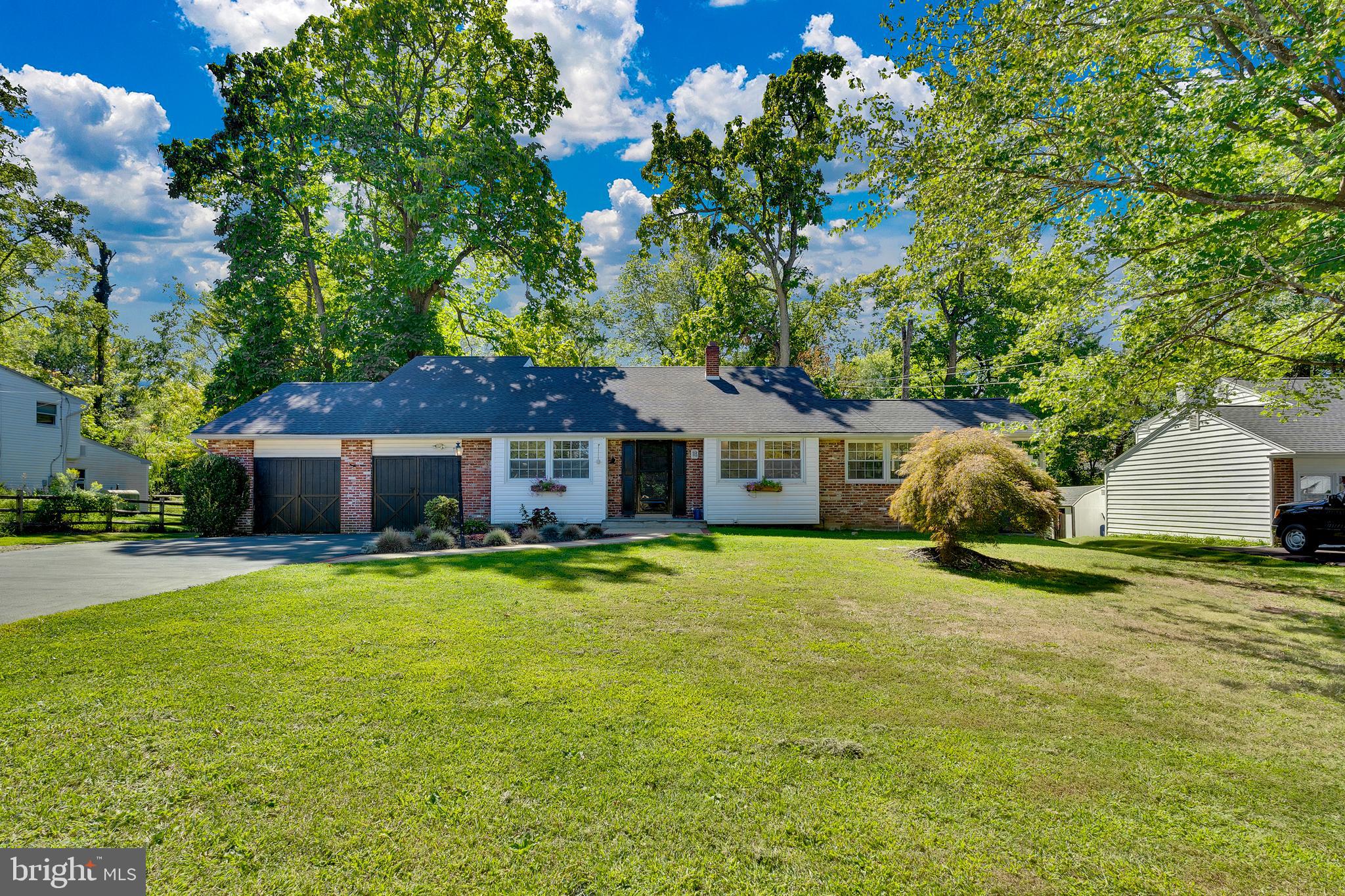 Don’t miss this beautifully updated 4/ 5 bedroom raised rancher in the highly sought-after "The Pines" neighborhood, located within the award-winning Methacton School District.
As you arrive, you'll immediately notice the home’s excellent curb appeal, featuring a charming brick-lined walkway, professional landscaping, and a welcoming covered front entry.
Step inside to discover the stunning upgraded kitchen, complete with white raised-panel cabinetry, quartz countertops, a farmhouse sink, stainless steel appliances, pantry, and both pendant and recessed lighting. The space is enhanced by a stylish shiplap accent wall, upgraded hardwood flooring, a breakfast bar with seating for three, and a spacious dining/breakfast area with access to the covered side deck—perfect for everyday living and entertaining. The kitchen flows seamlessly into the bright and airy living room, which boasts vaulted ceilings, beautiful hardwood floors, and recessed lighting throughout. Just a few steps down leads to a spacious family room featuring new flooring, fresh paint, and stylish glass-paneled sliding barn doors. This cozy space is ideal for relaxing or hosting movie nights. Adjacent to the family room is a private home office with built-in shelving—great for remote work or study. This level also includes a generous guest bedroom with sliding doors that open to the back patio, two upgraded half bathrooms, large mudroom with a built-in workstation, an additional bonus room with raised ceilings and a private exterior entrance—ideal for a home gym, playroom, media room, second office or more. Upstairs, the second level offers three bedrooms including, two sizable guest bedrooms and an upgraded hall bathroom featuring a new vanity, step-in tiled shower, and a lighted frameless mirror. The luxurious primary suite is a true retreat, featuring upgraded carpeting, fresh paint, detailed trim work, recessed lighting, and a walk-in closet with custom built-in organizers. The en-suite bathroom has been beautifully remodeled with a double sink vanity, lighted frameless mirrors, tiled flooring, and a custom tiled tub and shower. Outdoor living is just as impressive, with a covered deck, an open deck area, and a large concrete patio—perfect for enjoying the serene backyard setting. Conveniently located just minutes from the Route 422 (Trooper) entrance, this home offers easy access to King of Prussia, Collegeville, and Philadelphia. You're also only five minutes from the popular Oaks shopping district, featuring Lowe’s, Target, BJ’s Wholesale, P.J. Whelihan’s, Wawa, Starbucks, and more.
Quick Settlement Possible!