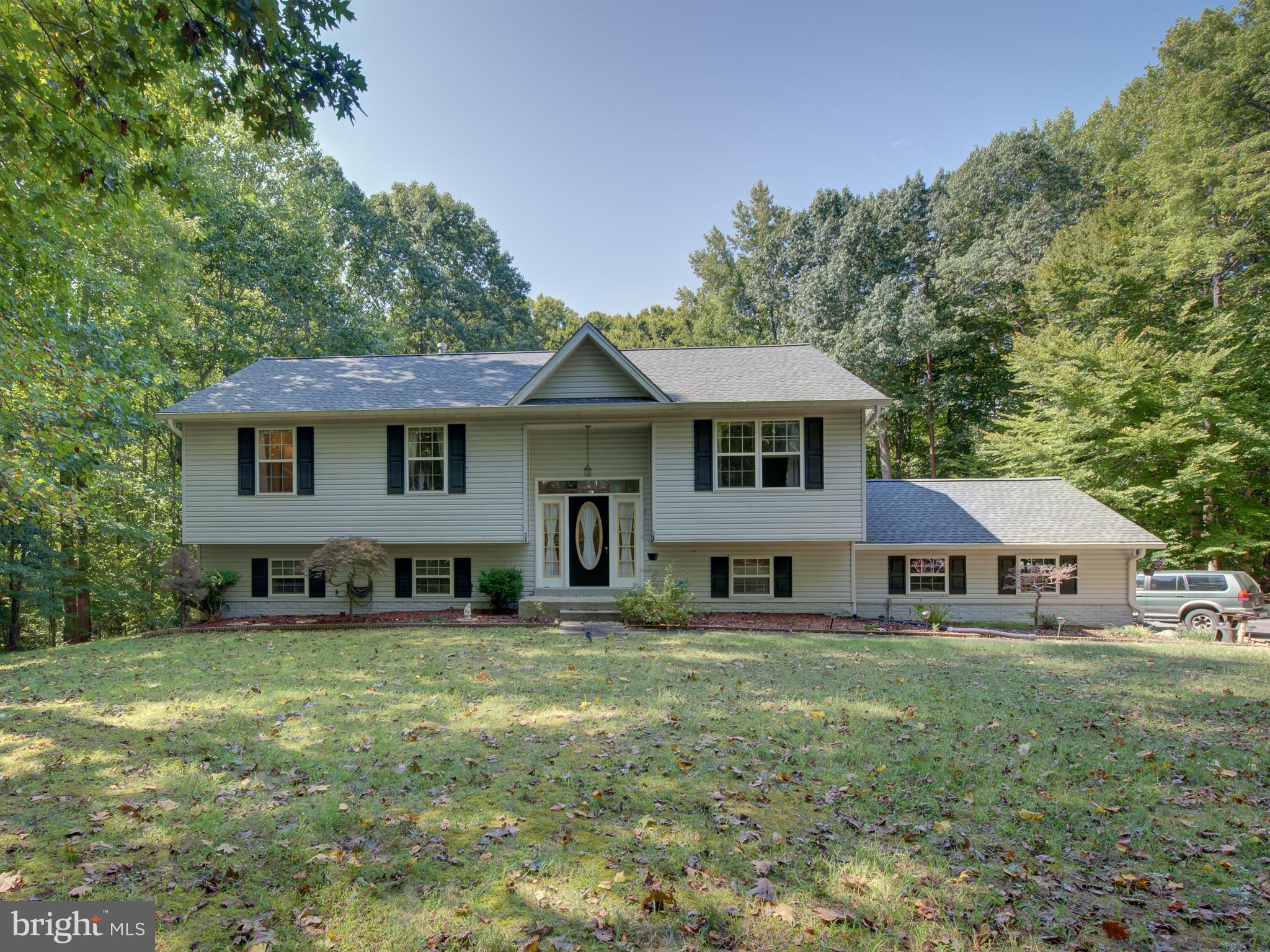 Welcome to beautiful Single family Split Foyer home! This home is ready for a new owners to unpack and settle in. Roof replaced approximately 2 yrs ago . Main level leads to formal living and dining room and fully equipped kitchen with pantry. From the dining room sliding door leads to netted cover porch to relax with family. The hallway guides you to the Master bedroom with attached full bath with Jacuzzi and good size closet. Specious 2 bedroom with closet and another full bath located in hallway. Good size walkout basement with fireplace and additional bedroom with closet and full bath. Separate room for laundry, storage and utilities. You'll enjoy the fenced and beautiful leveled backyard. House have attached 2 car garage and take advantage to park multiple cars in long and wide driveway (5 years old) . Shed is a bonus for additional storage for a new owners.
