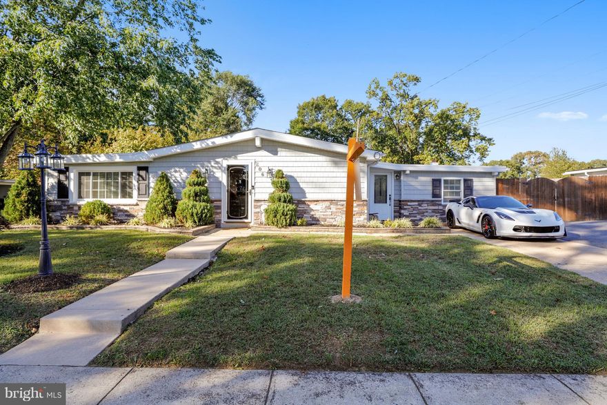 A stunning home which has been fully renovated and offers more than 2200 sq ft on one level!  Unheard of in this price bracket. Open, modern living area with cathedral ceilings, beautiful fixtures and newly added shiplap accent wall. The kitchen is as beautiful as it is functional.  The counters and generous dining island are adorned with gorgeous granite. Custom cabinets with built-ins and SS appliances.  Shades of grey and off-white are beautifully complimented throughout with oil rubbed bronze fixtures. Main bath has been updated with ceramic tile flooring, custom tile bath tub surround and even a flat screen TV! Bathroom 2 has a large seamless glass shower with custom tile, rain shower head and multiple body sprays.  All bedrooms are generous sized. French door at kitchen leads to a fully separate living area which could be used as an inlaw apartment/au pair suite/roommate situation. Living area/dining area/BR and full kitchen area beautifully done with everything less range/stove.  One year seller paid HMS home warranty, COFHOC