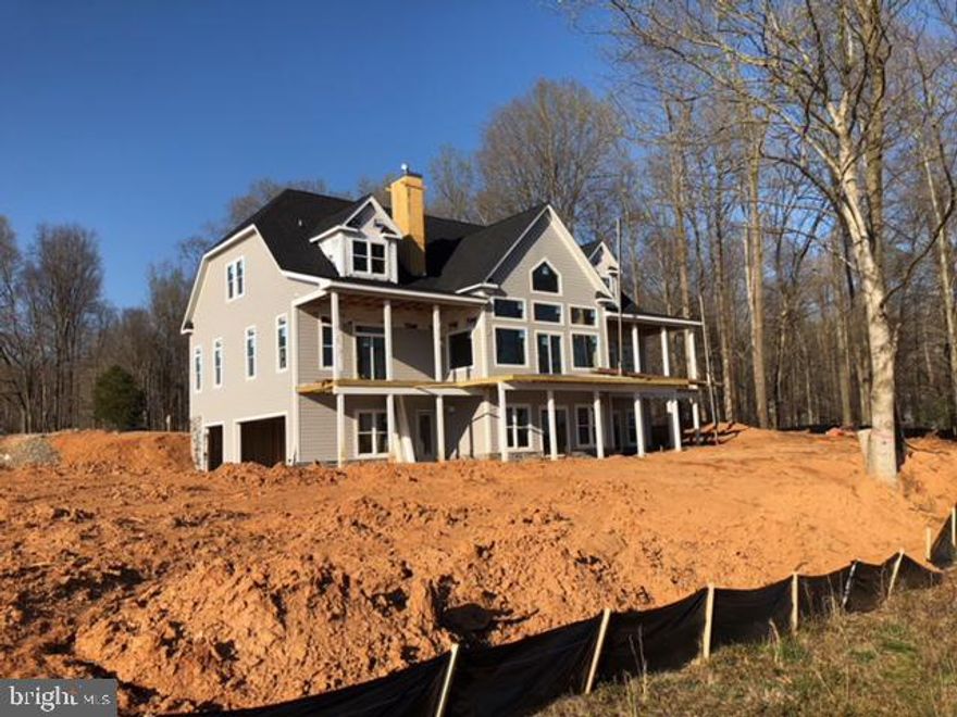 Stunning construction water front home on Lake Anna in Louisa County. Shaft for 3 level elevator.  Over 6100  square feet of living space on all 3 levels with 7 Bedrooms 5 full Baths and 2 large multi-purpose rooms. Multiple decks and screened in porches. Gourmet kitchen, incredible views and room for large scale entertaining. Still time to select interior colors and upgrades along with options for a Boathouse.