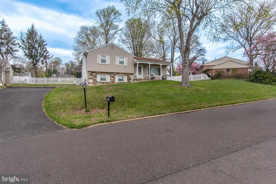 3 Bedroom 2.5 Bath Split Level Home with over 1800 square feet of living space is located in the Desirable Lower Moreland School District. The main level offers newer hardwood flooring throughout the living room, dining room and kitchen along with crown molding, large front window and coat closet. The dining room has chair rail, crown molding and decorative lighting. The newer eat-in-kitchen features plenty of cabinets, Quartz countertops AND Quartz backsplash. Appliances include refrigerator, dishwasher, commercial 6-burner gas range with hood vent. Recessed lighting and the cutest designated coffee bar with shelves above. Just in time for spring and summer. Sliding glass door to ALL season room with wall-to-wall carpet, plenty of windows, skylights, ceiling fan and split unit for AC and Heat. Best of all, exit to rear patio with retaining wall and large rear yard with shed. Heading to the upper-level, the hallway offers linen closet, 3-piece ceramic tile hall bath, attic fan and 3 large bedrooms. All the bedrooms feature carpet, ceiling fans and spacious closets BUT the primary bedroom also offers a full bath with stall shower. The lower level is finished with plank flooring, brick front wood top bar with pendant lights, brick front gas fireplace with mantle. In addition, there is a BONUS room, perhaps a 4th bedroom/guest room/office also with plank flooring. The lower level offers a laundry room with half bath, (this area is all drywalled and taped, ready for your personal touches of paint and decoration). Side door provides easy access to the 6+ car driveway and side yard. There is plenty of storage via access to the left of the bar, be sure to check it out on your visit. Close to Schools, Huntingdon Valley Country Club, Philmont Country Club, Holy Redeemer Hospital, Philmont Septa Station and Bethayres Septa Station, Lorimer Park, Restaurants and Shopping. Good luck on your showing at 3268 Oak Road!